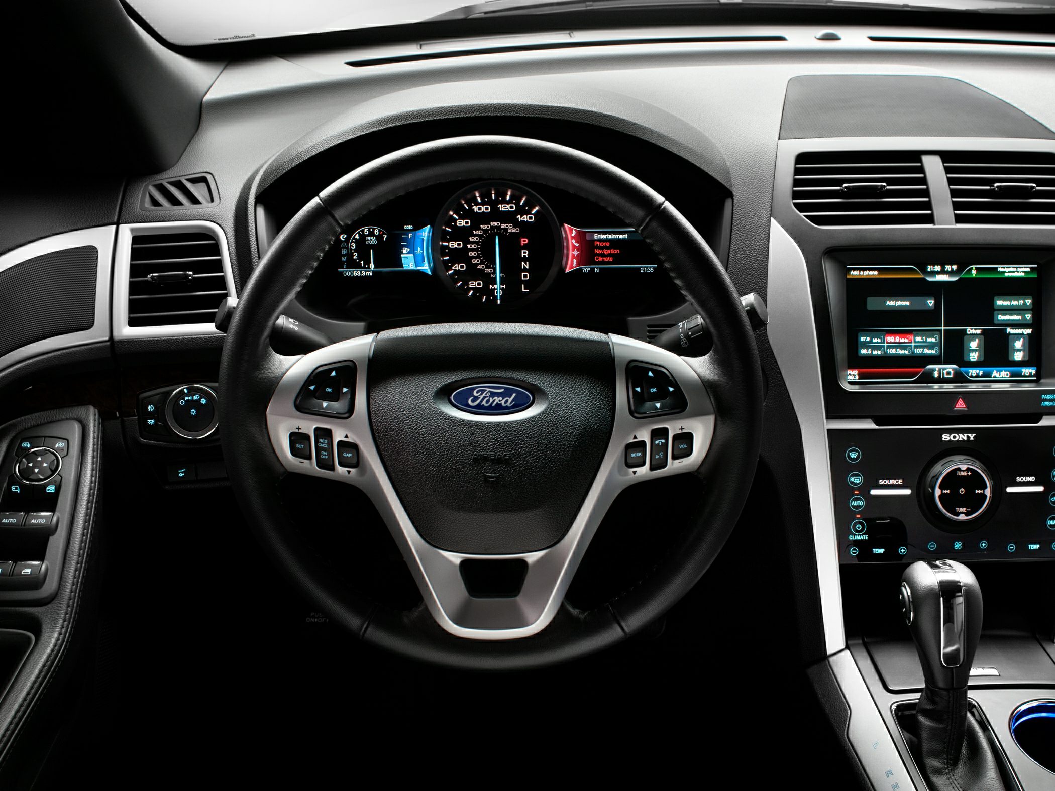 Steering wheel, digital dashboard, and infotainment console interior