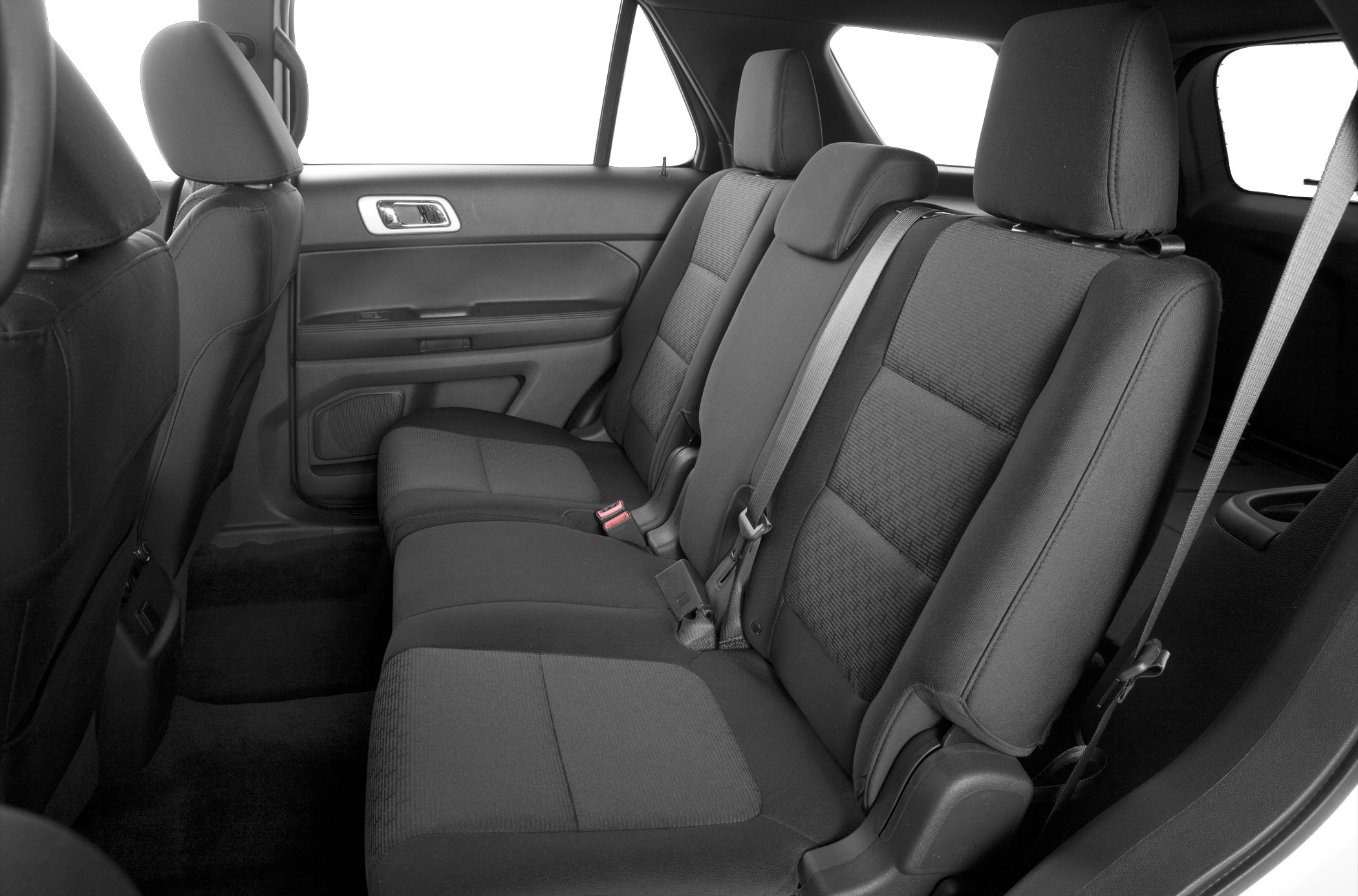 Spacious rear seats with fabric upholstery and seat belts.