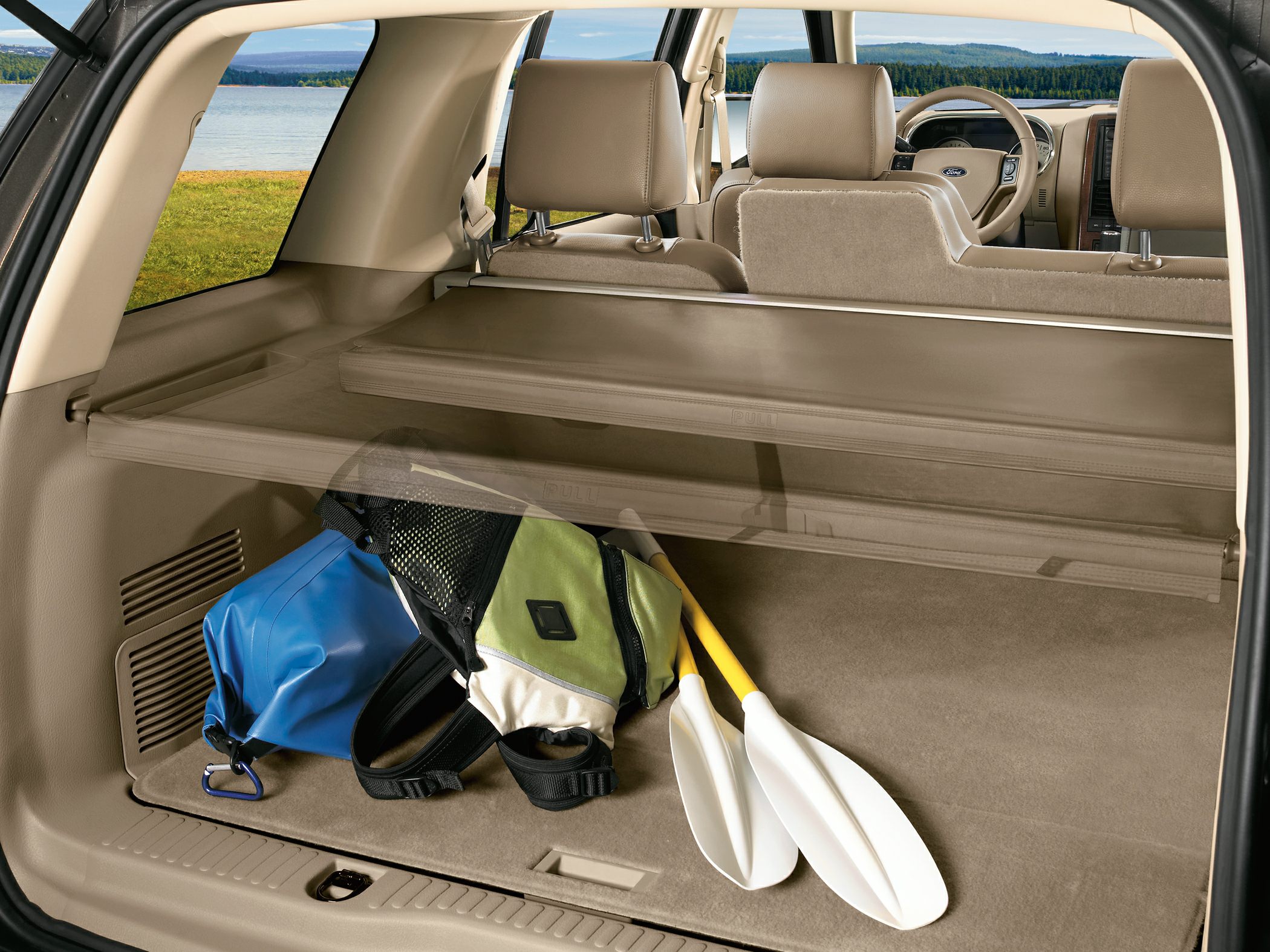 Spacious cargo area with retractable cover and beige upholstery