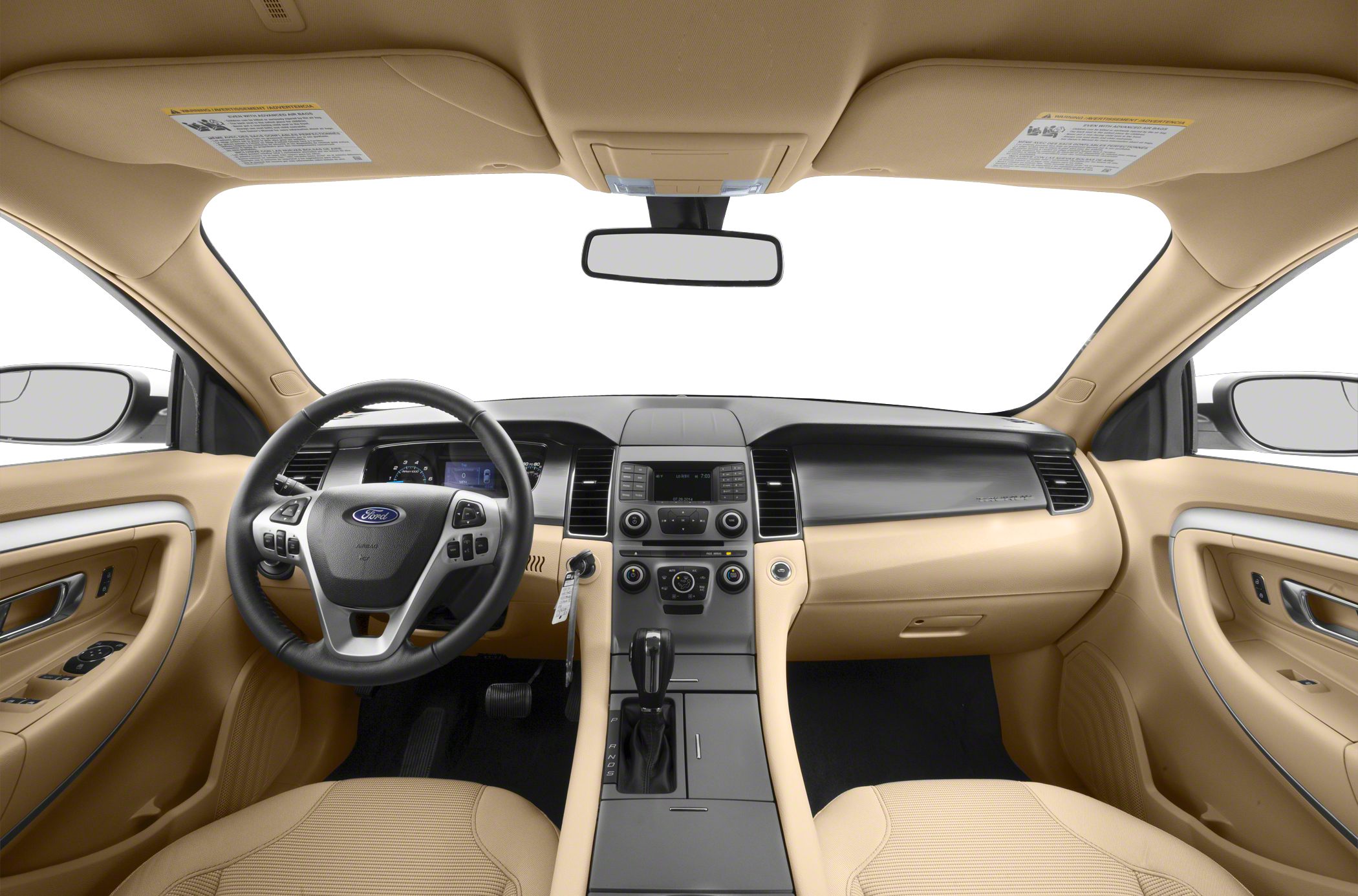 Tan interior with steering wheel, center console, and dashboard controls