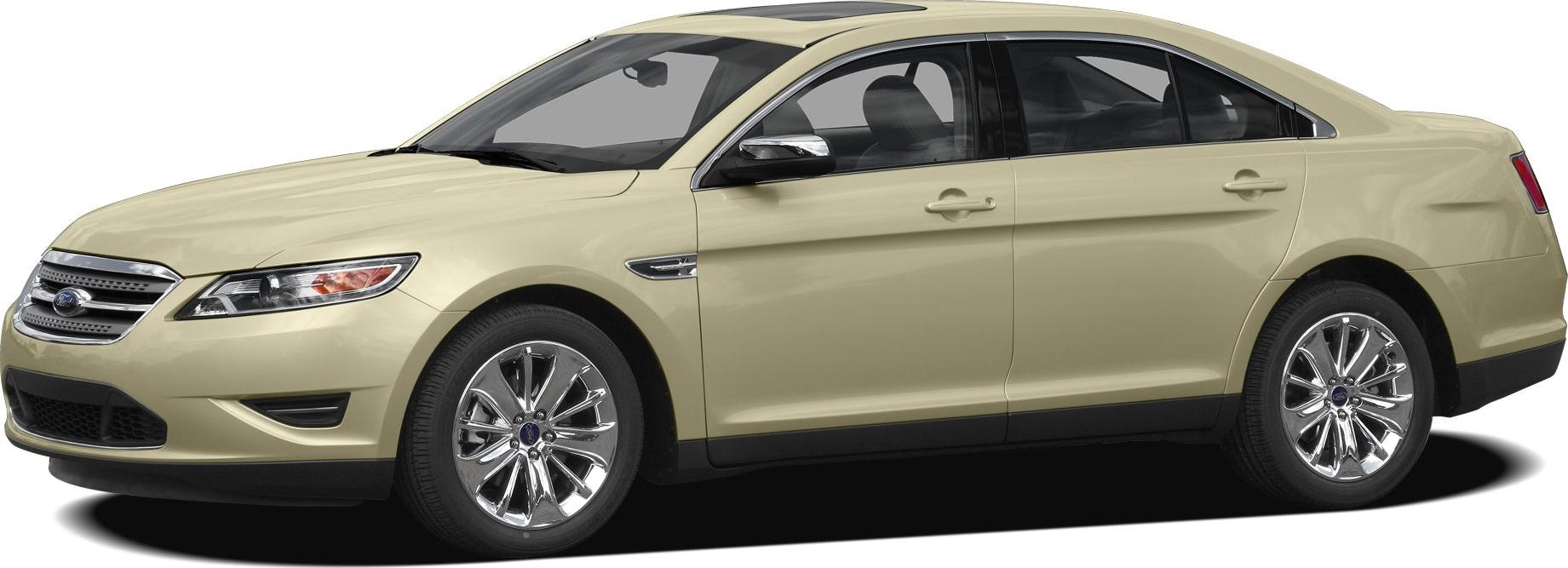 Beige mid-size sedan with chrome alloy wheels and four doors