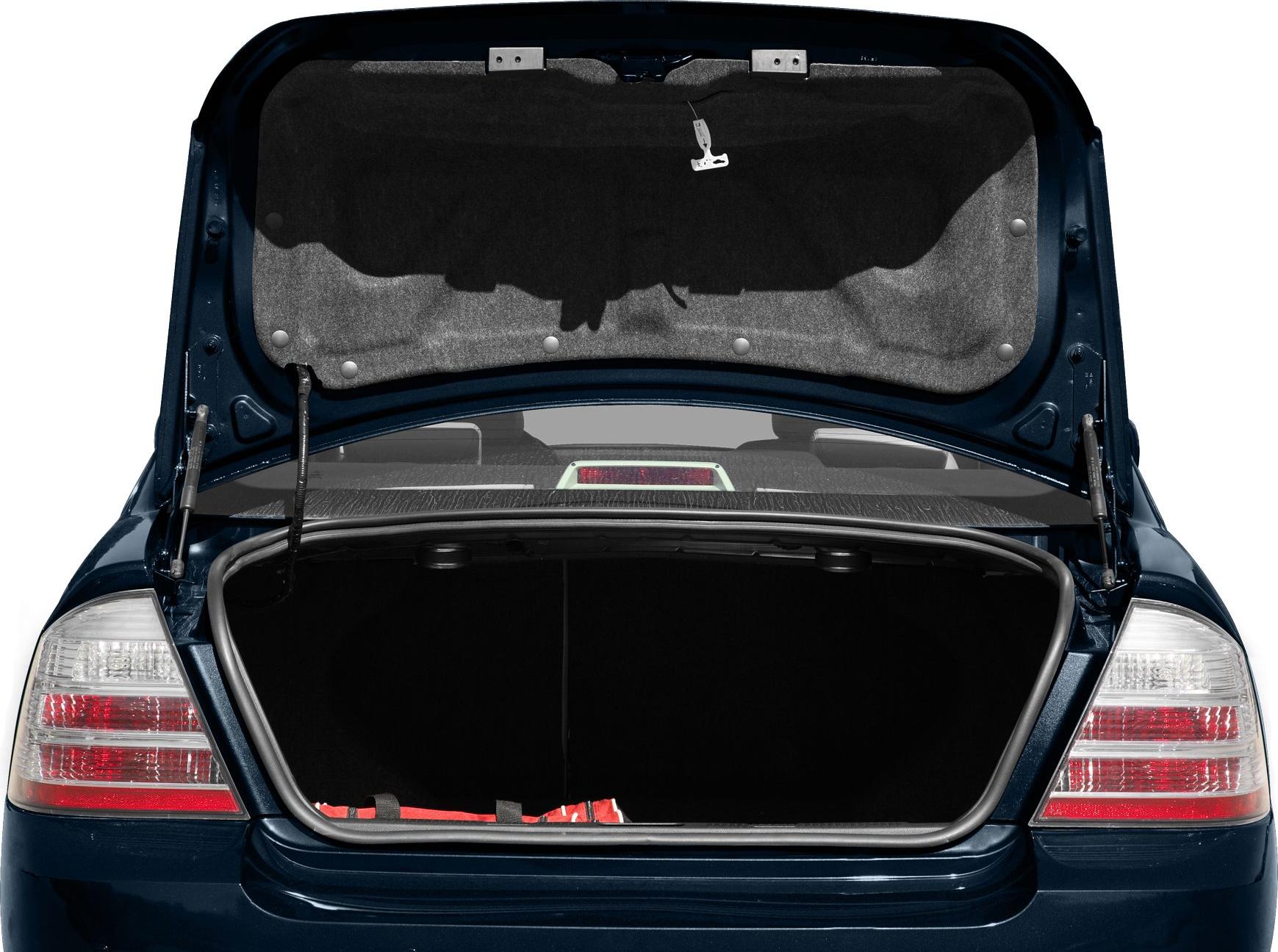 Open trunk showing spacious cargo area and rear light clusters.