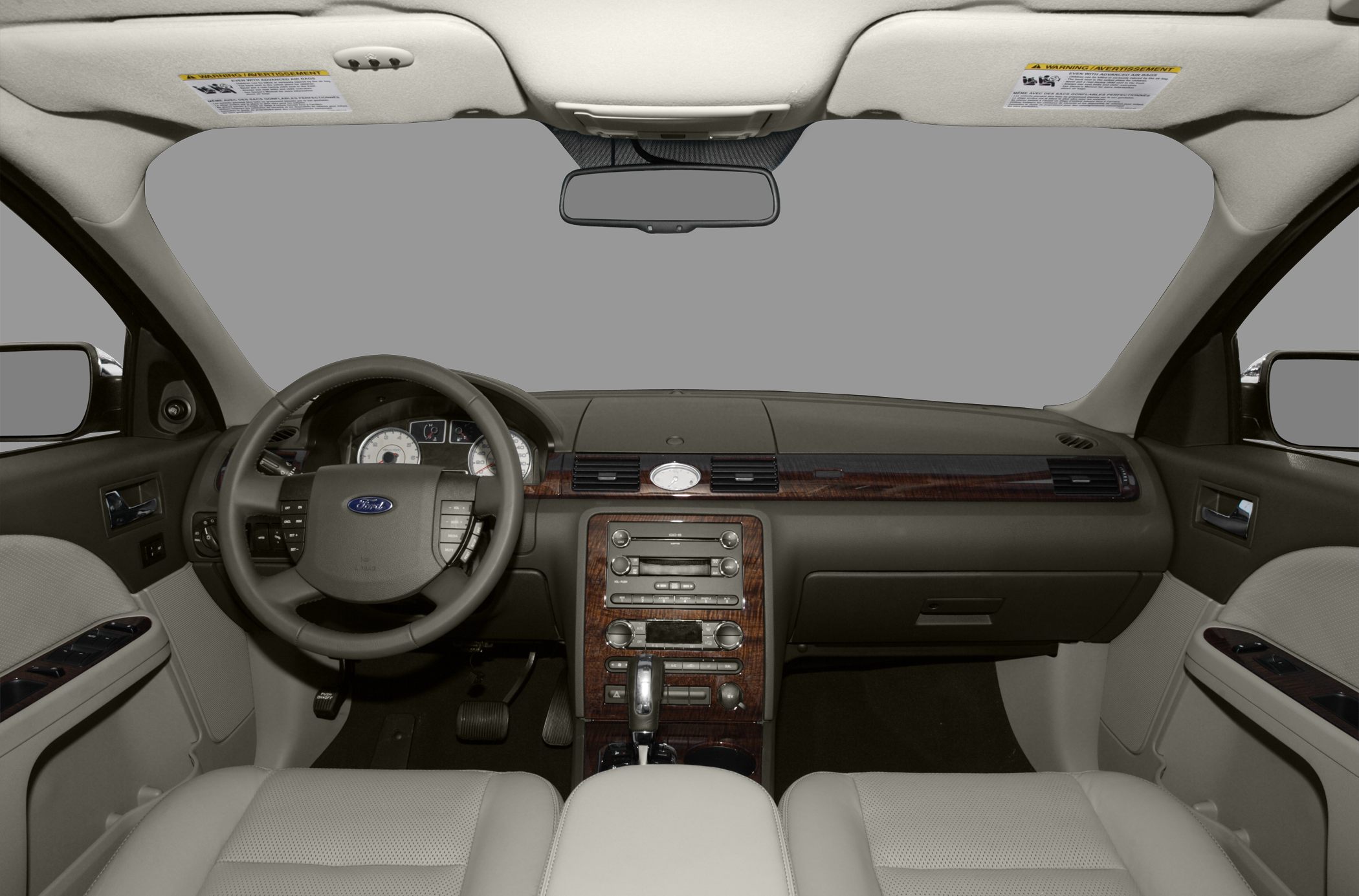 Dashboard, steering wheel, center console with wood trim interior