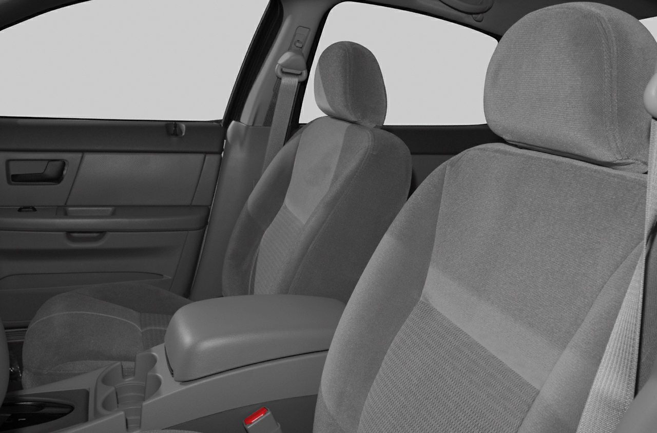 Front seats and center armrest with fabric upholstery
