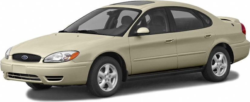 Beige sedan with rounded headlights and alloy wheels