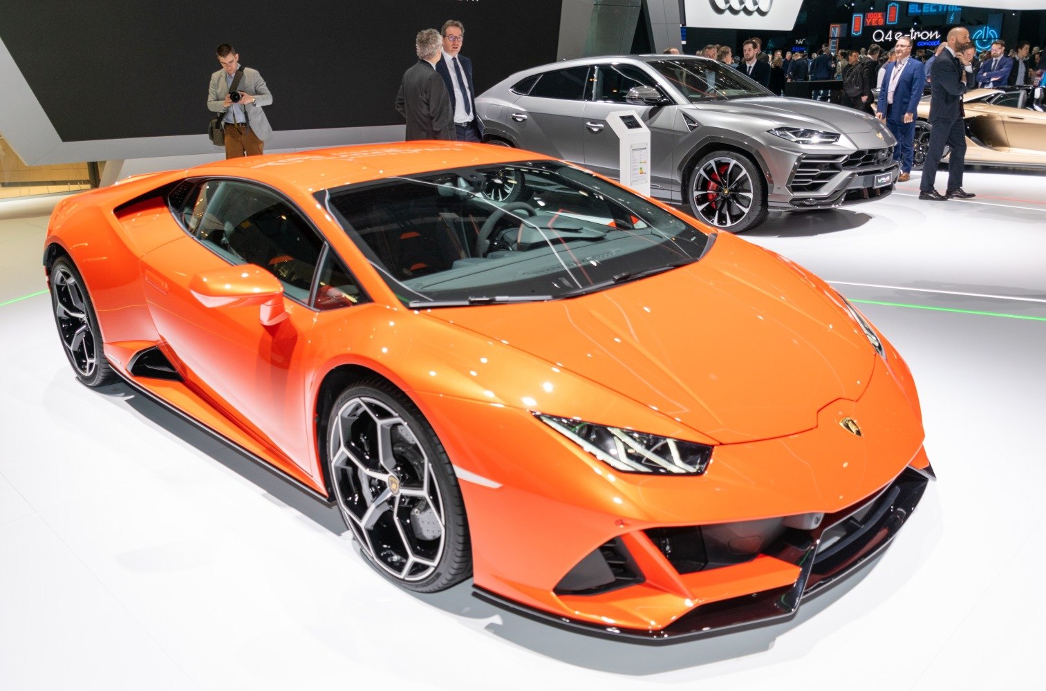Angular orange sports coupe with distinctive lights and alloy wheels