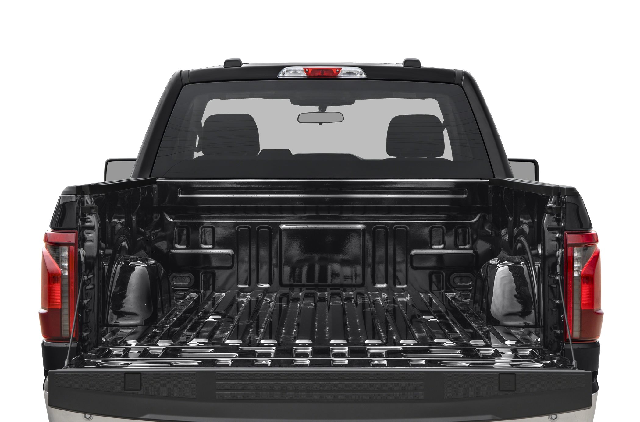 Open spacious pickup truck bed with tailgate down, rear view.