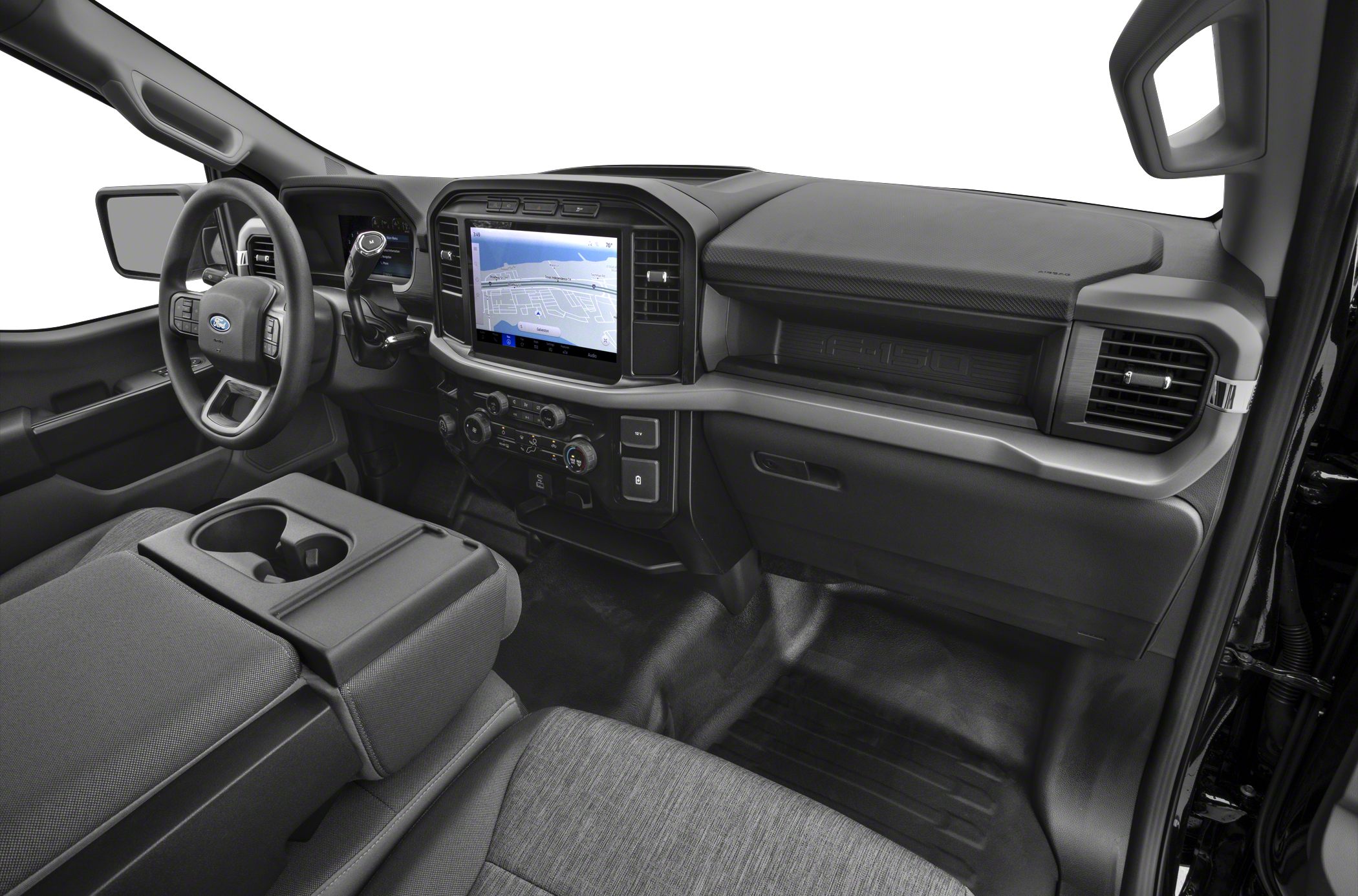 Modern truck interior with touchscreen, steering wheel controls, and fabric seats