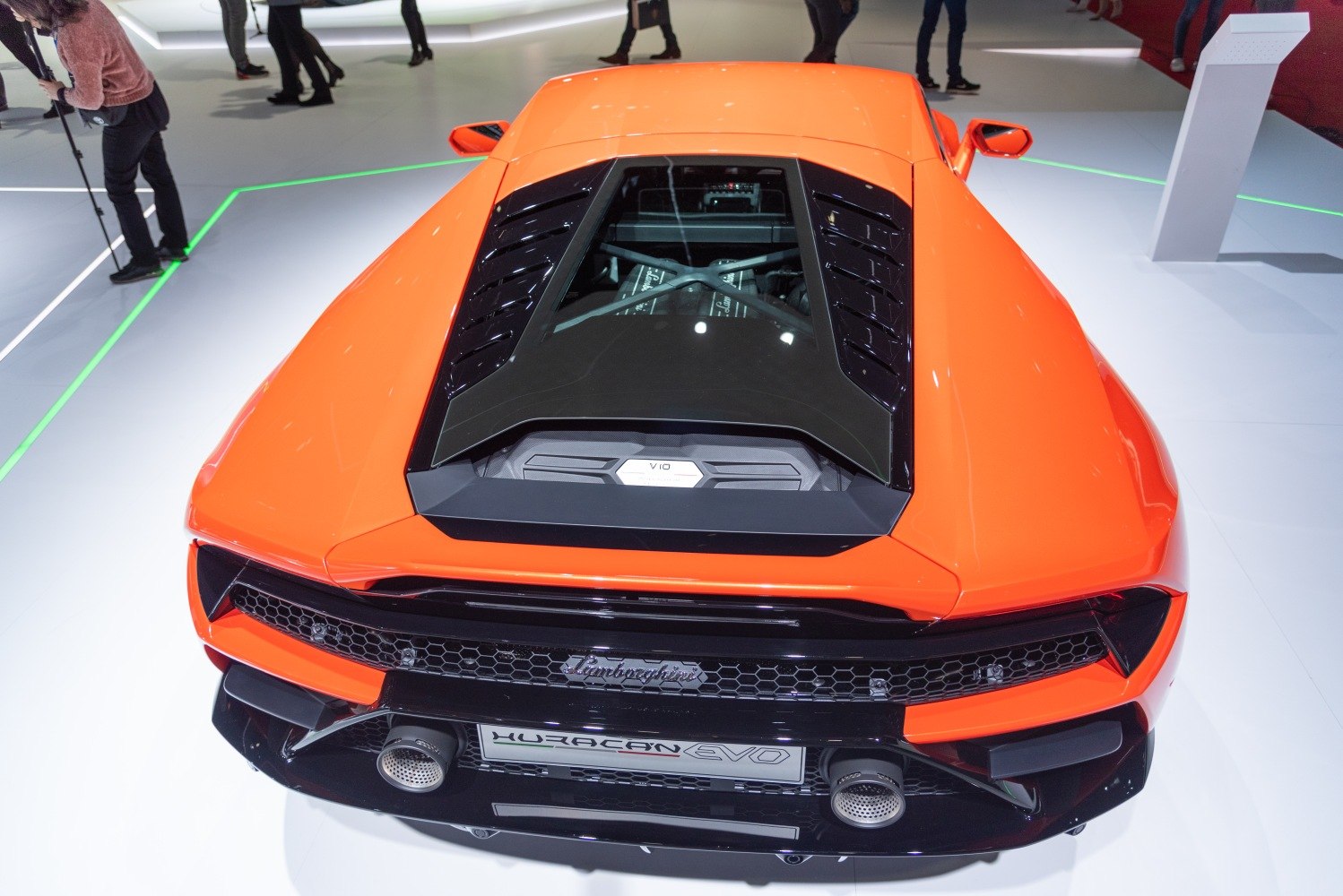 Rear view showing V10 engine through glass cover and dual exhausts