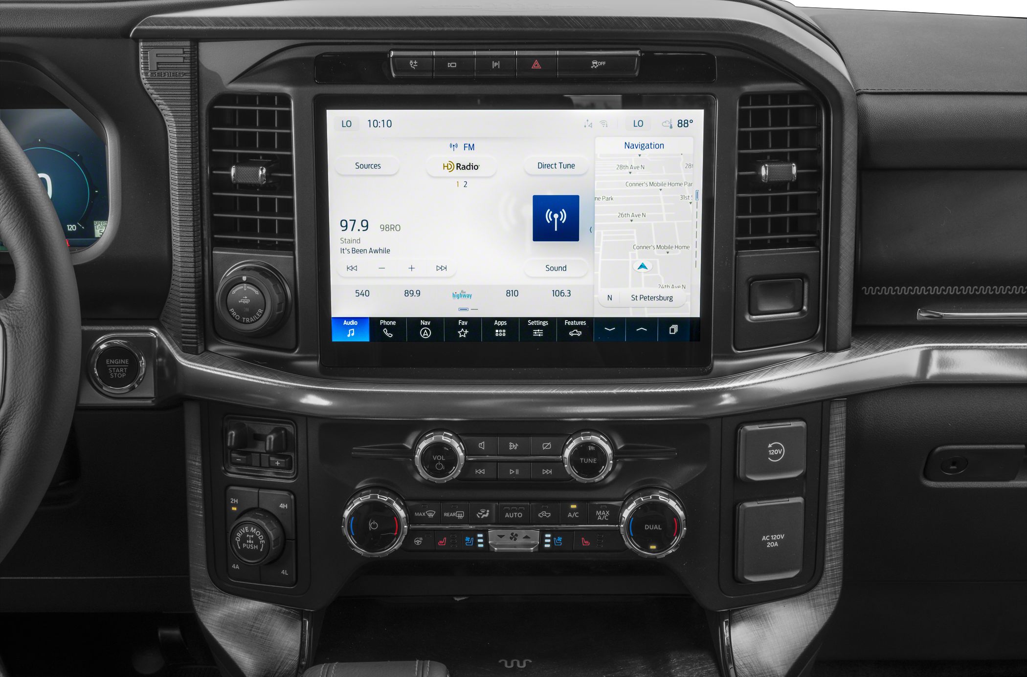 Touchscreen infotainment and climate control system on a modern truck dashboard