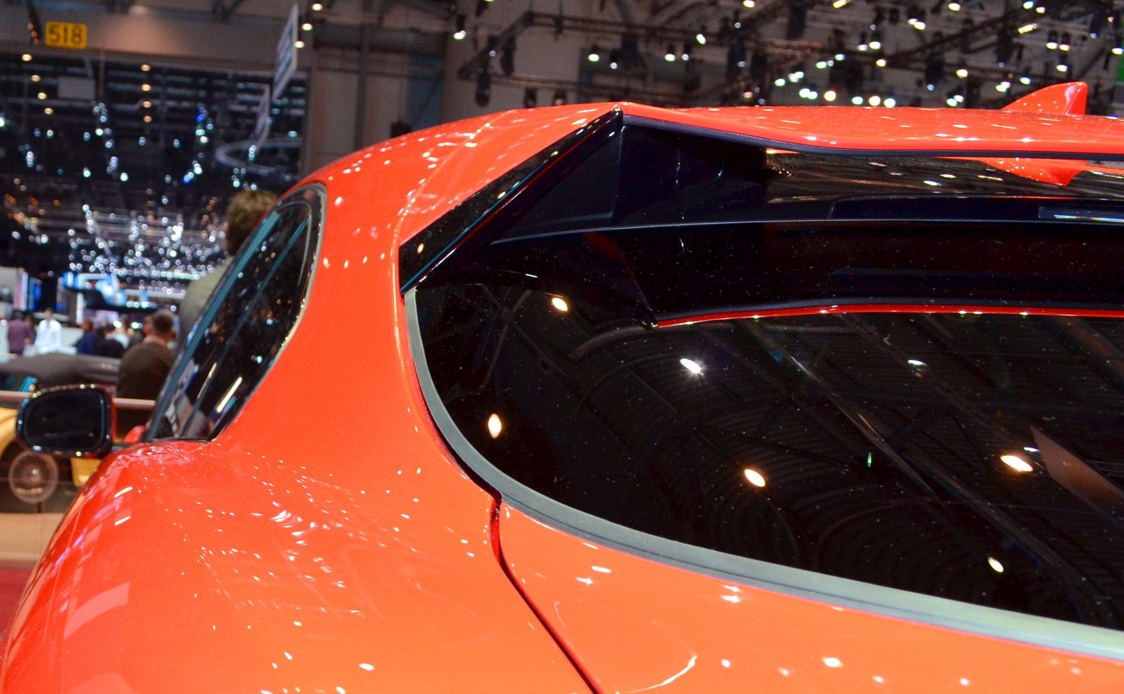 Distinctive rear window and roof spoiler design.