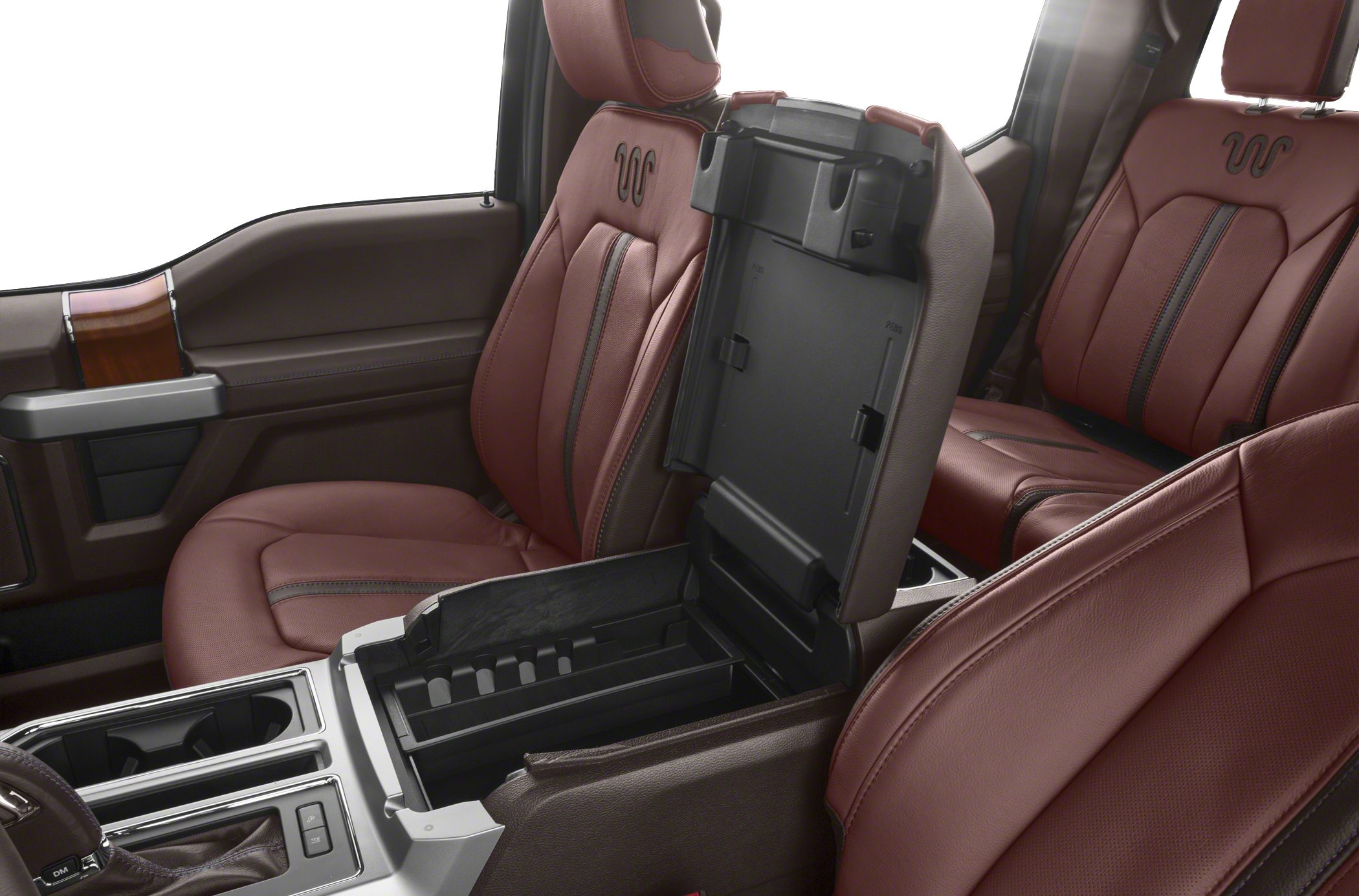 Open center console storage with brown leather seats