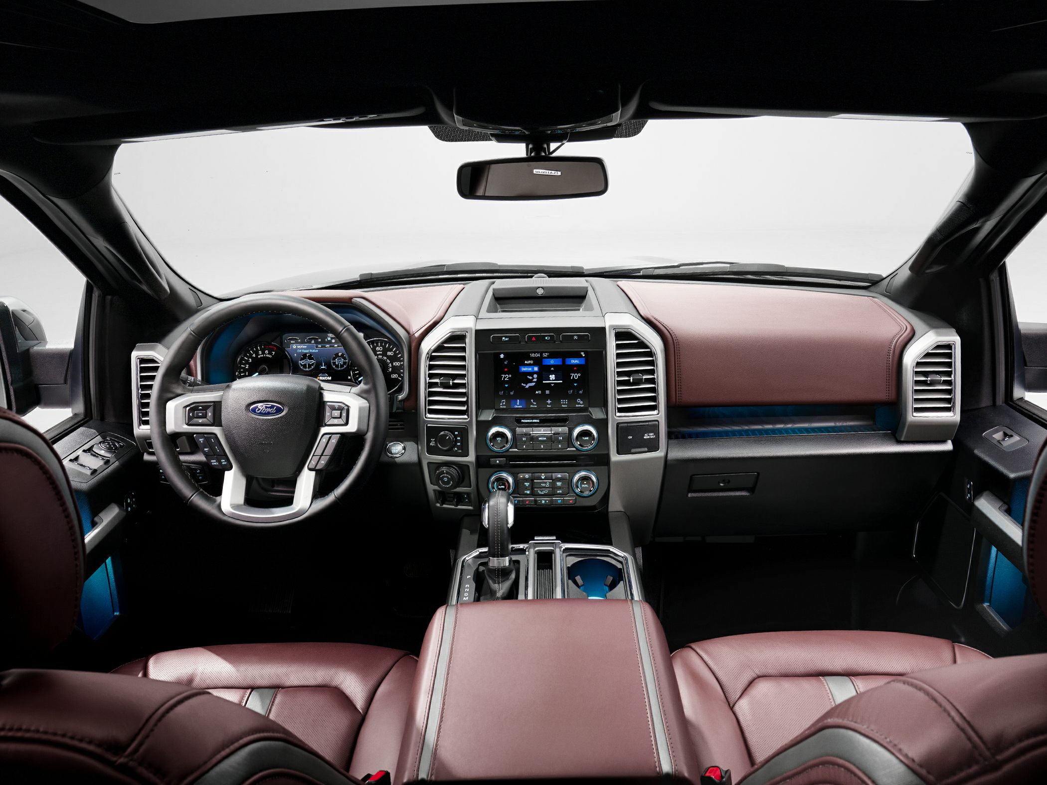 Truck interior with touchscreen dashboard and leather seats