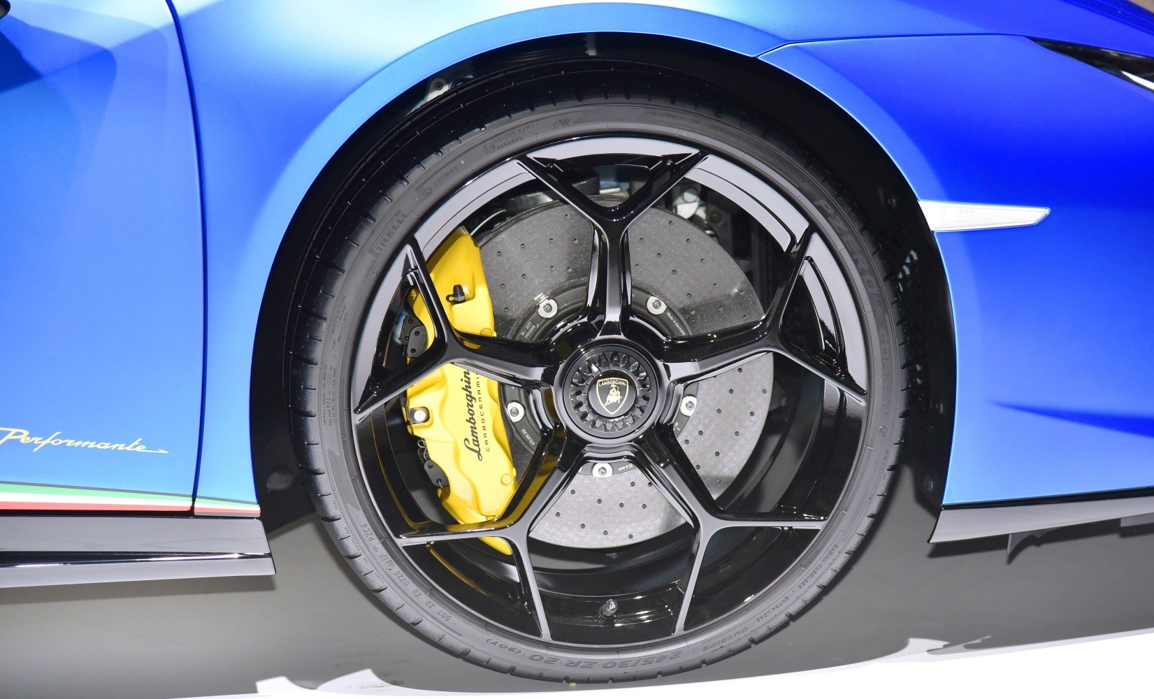 Black alloy wheel with yellow carbon ceramic brake caliper