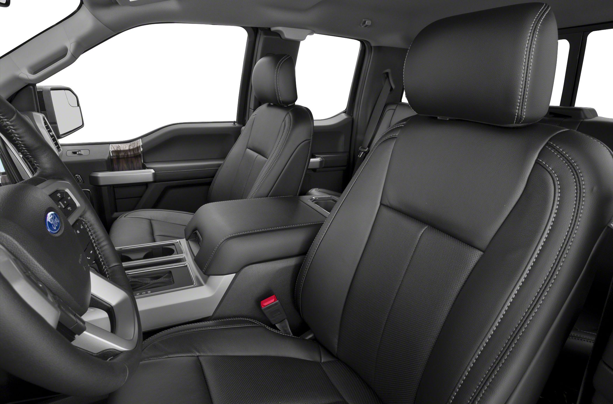 Black leather seats and center console in truck interior.