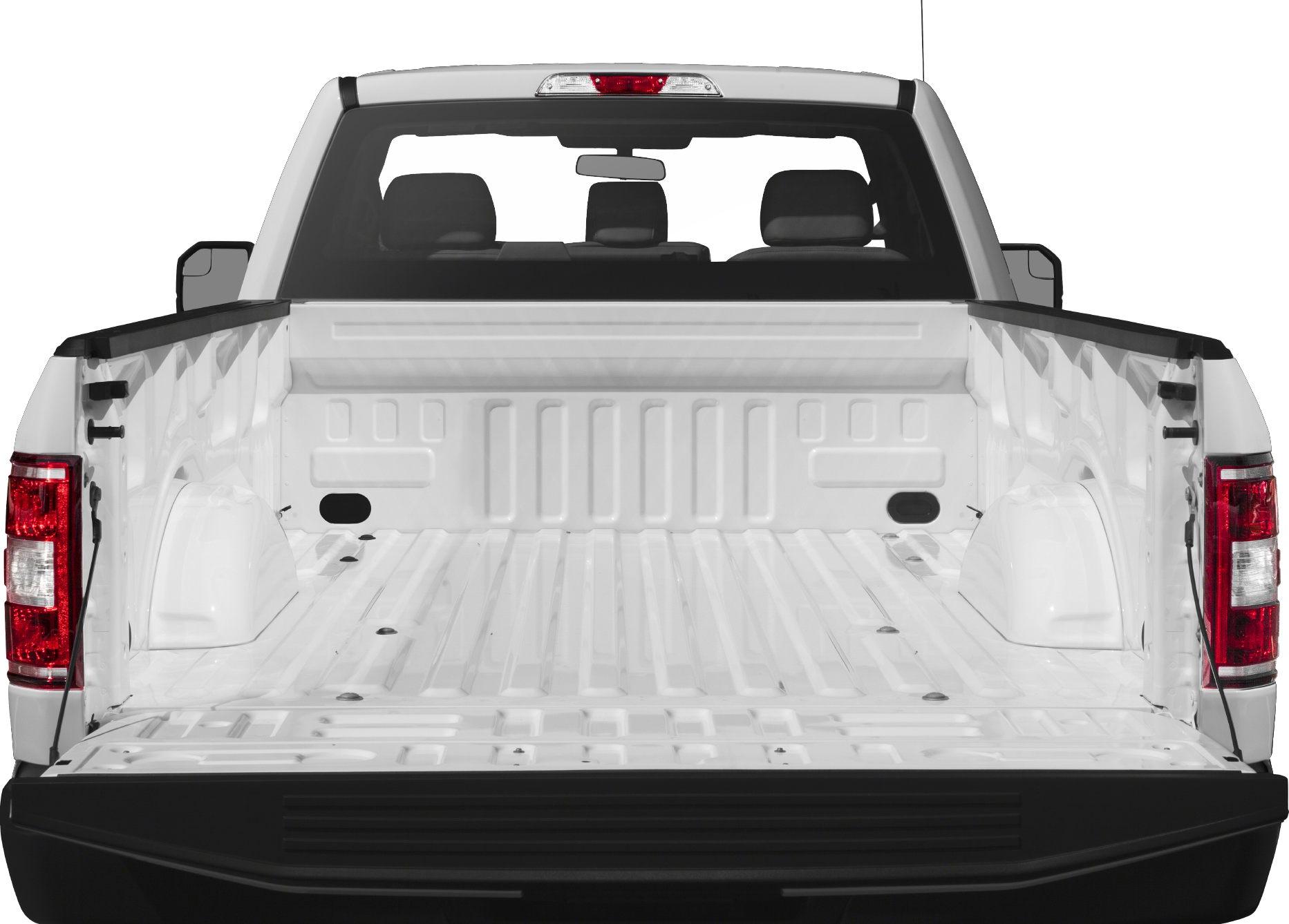 Open rear cargo bed with tailgate down and visible cab interior