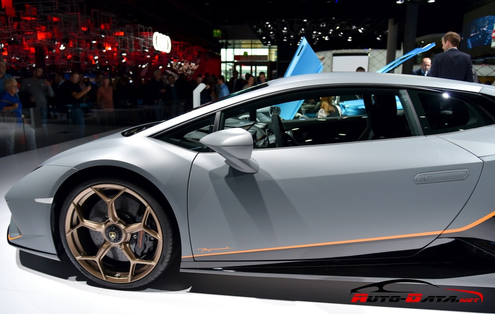 Sleek coupe side profile with bronze multi-spoke wheels