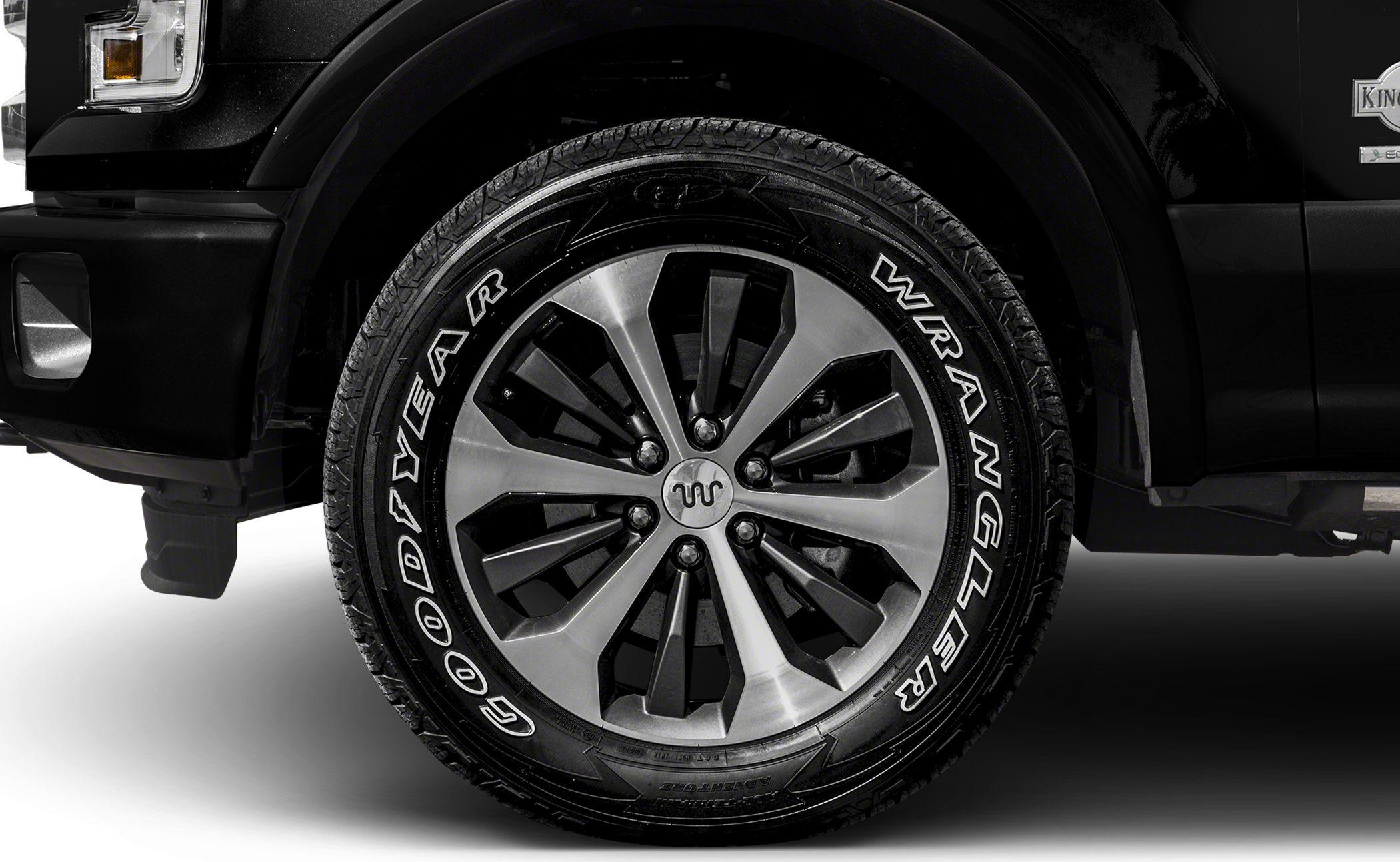Close-up of alloy wheel with Goodyear Wrangler tire.