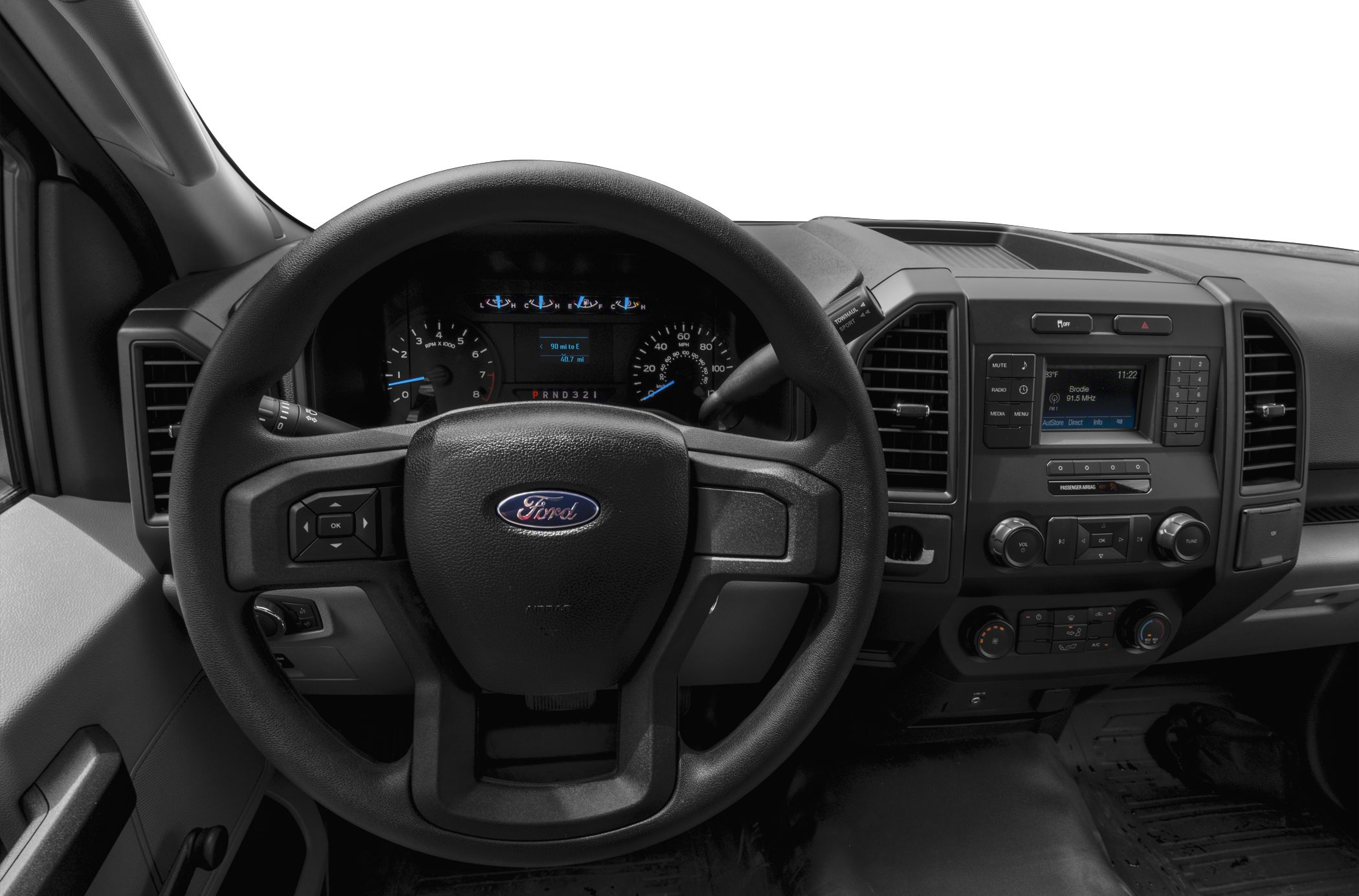 Steering wheel, instrument cluster, and center console of a truck interior