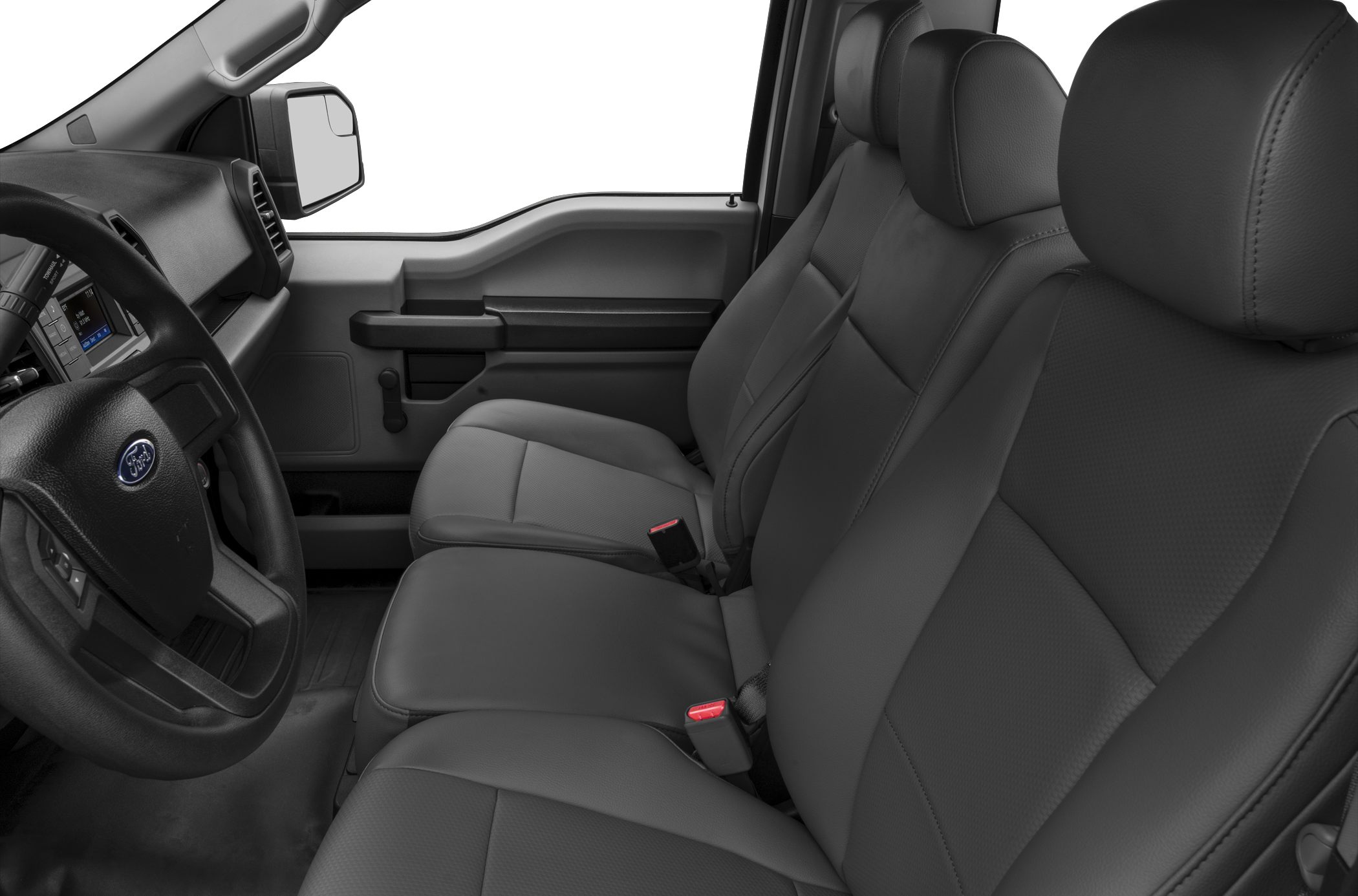 Front bench seats and dashboard inside a truck cabin