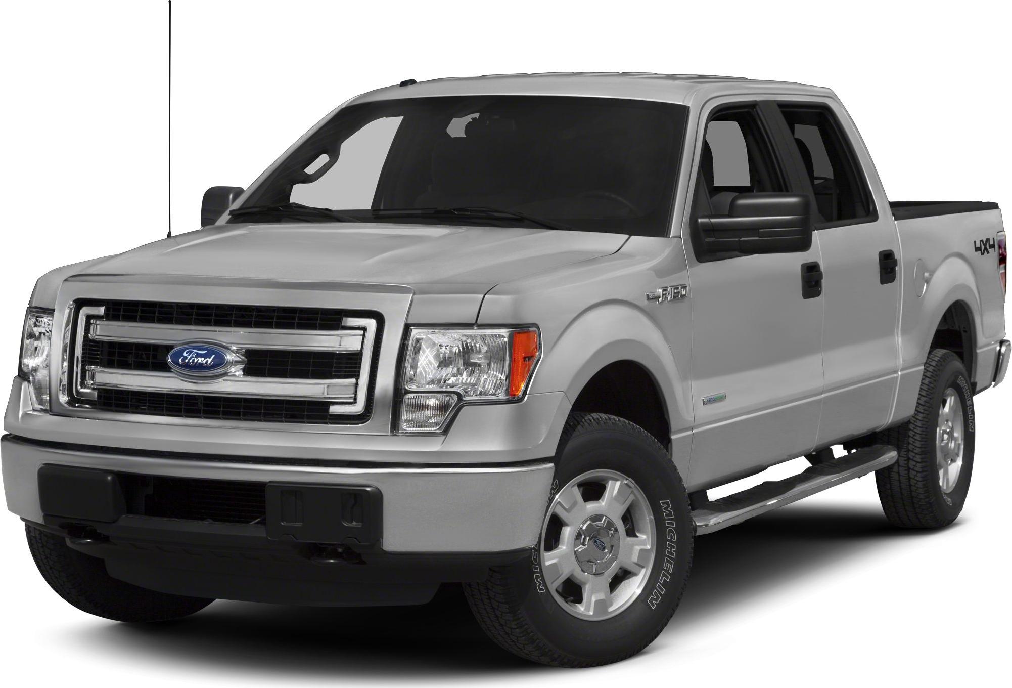 Front-side view of a pickup truck with prominent grille and side steps