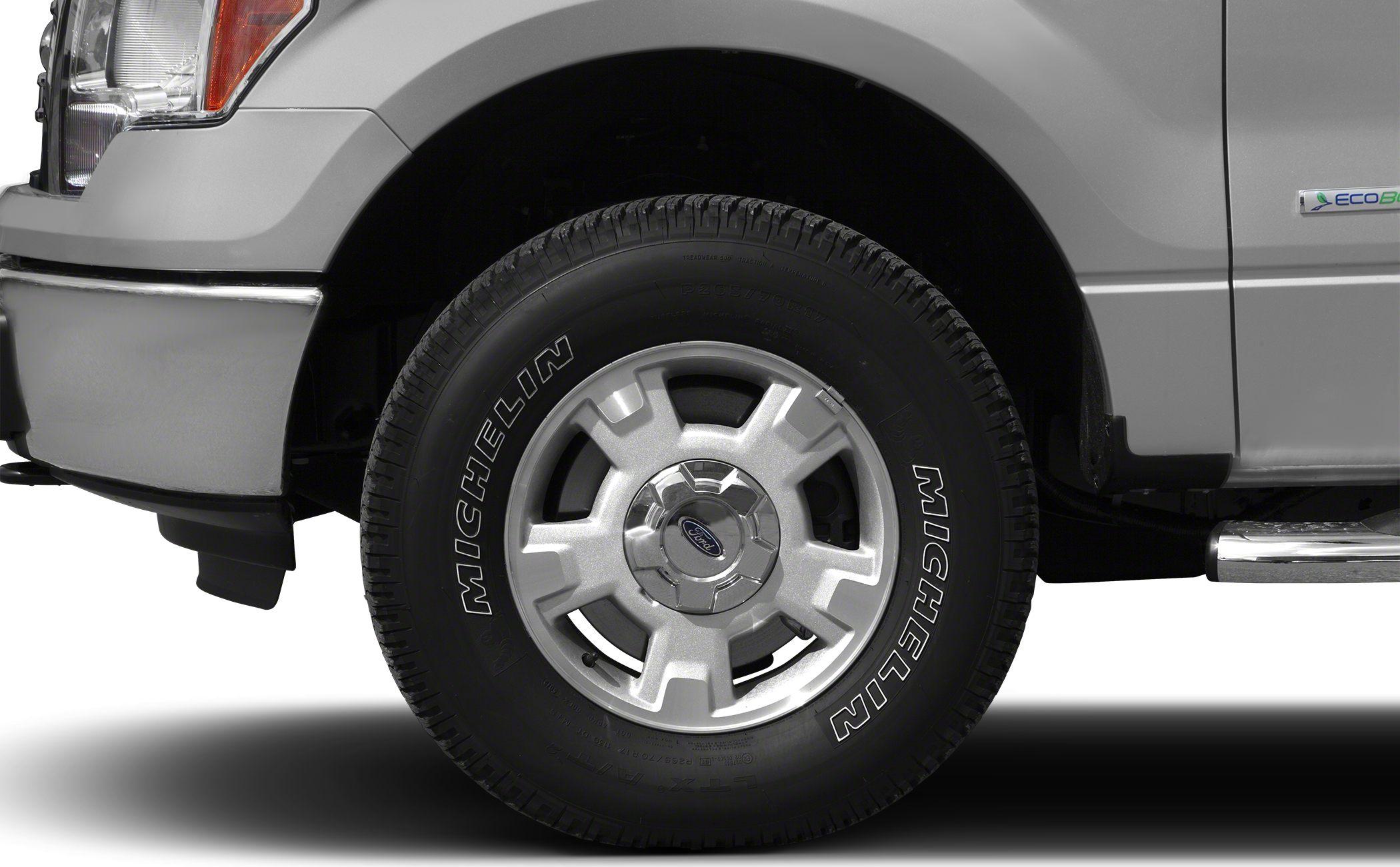 Close-up of wheel with Michelin tire and alloy rim