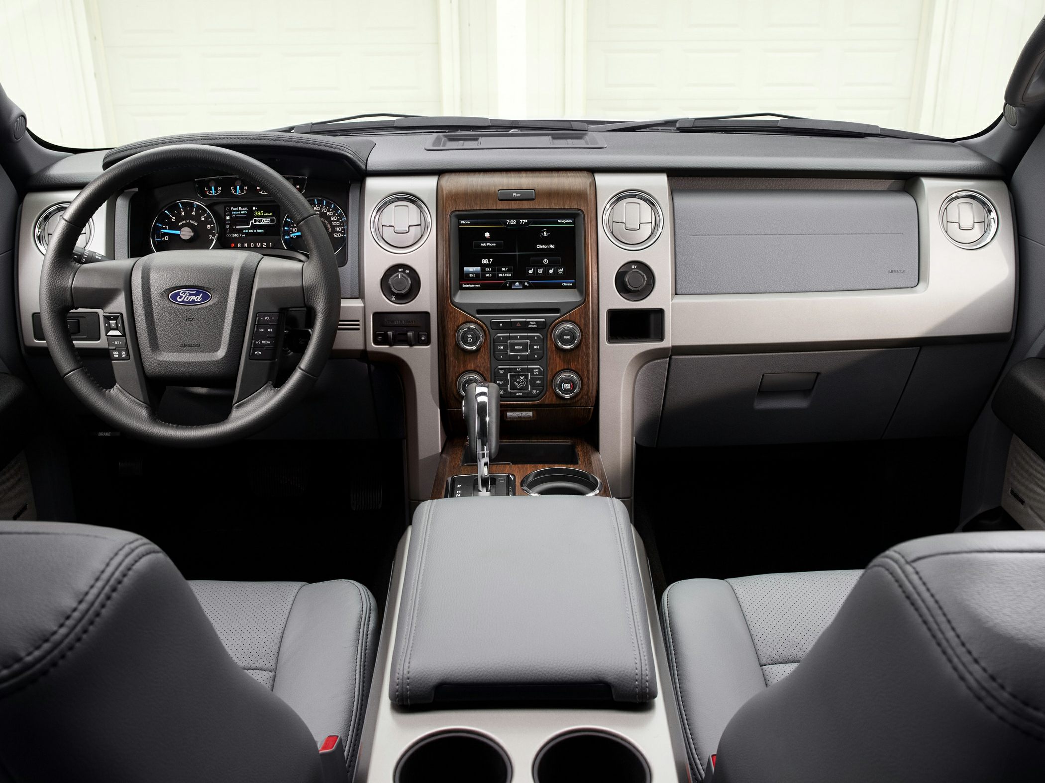 Dashboard, steering wheel, center console with multimedia system.