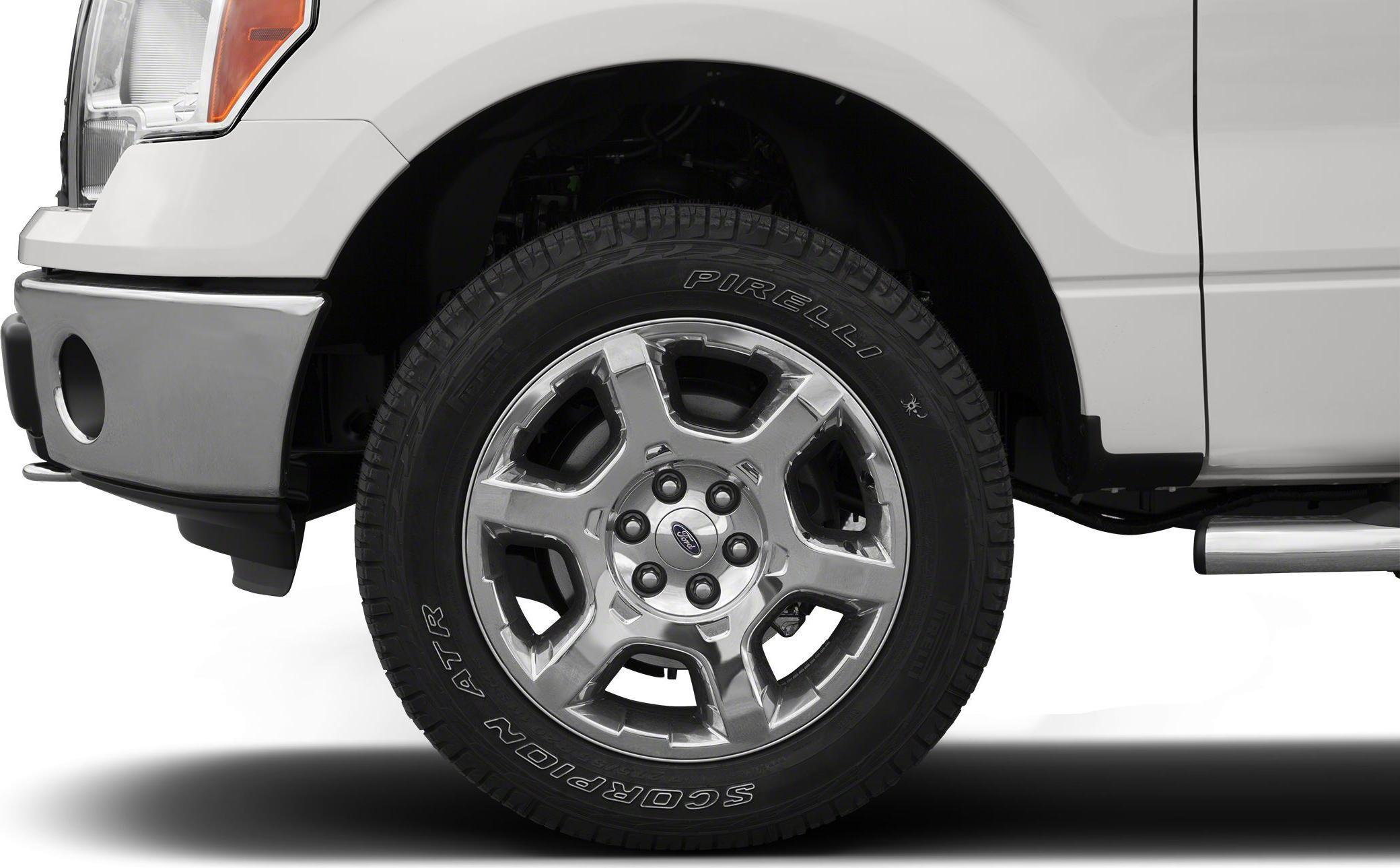 Front wheel and tire with alloy rim and Pirelli Scorpion A/T tire.