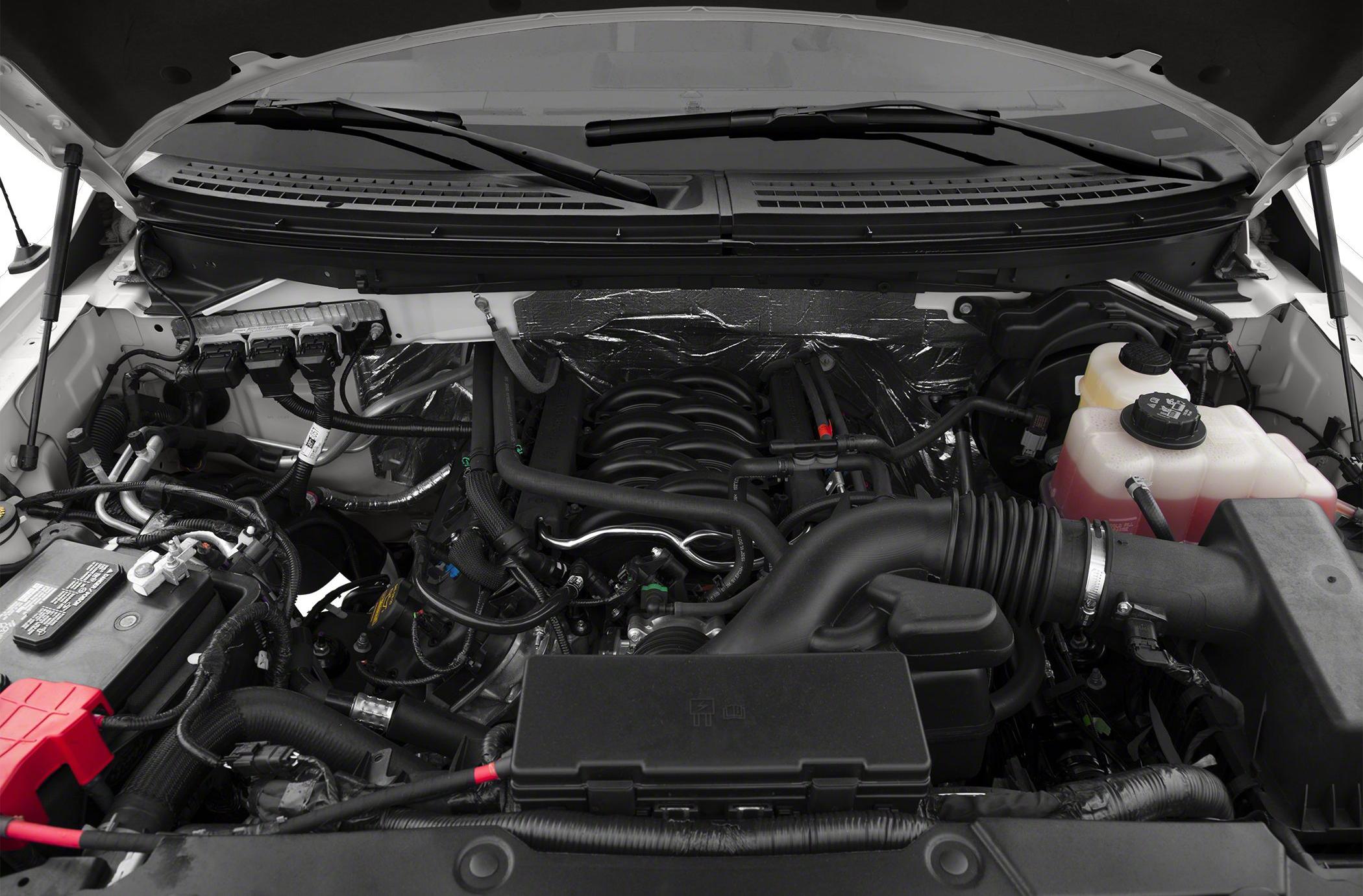 Engine bay close-up showing detailed mechanical components and layout