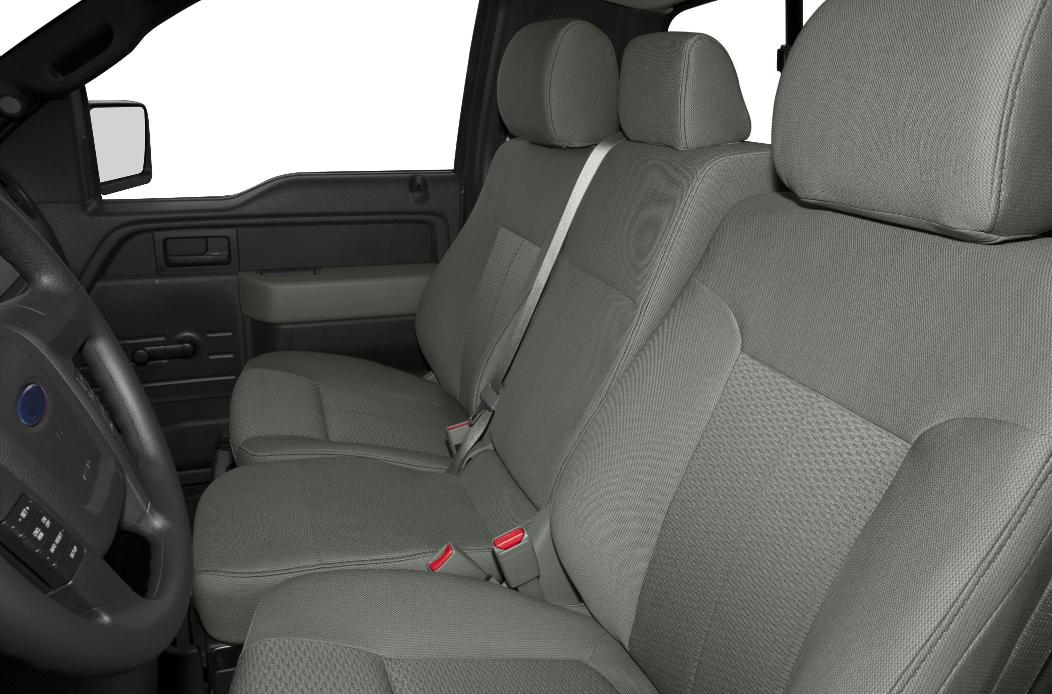 Front fabric bucket seats and door panel interior of a truck