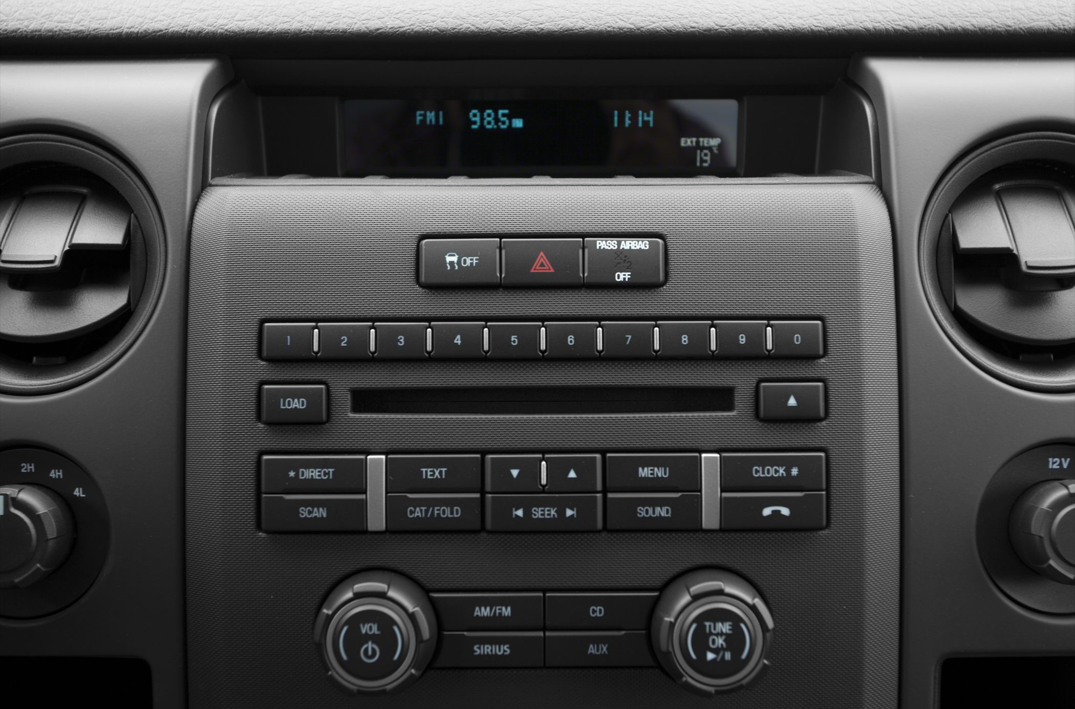 Close-up of Ford truck radio and climate control panel