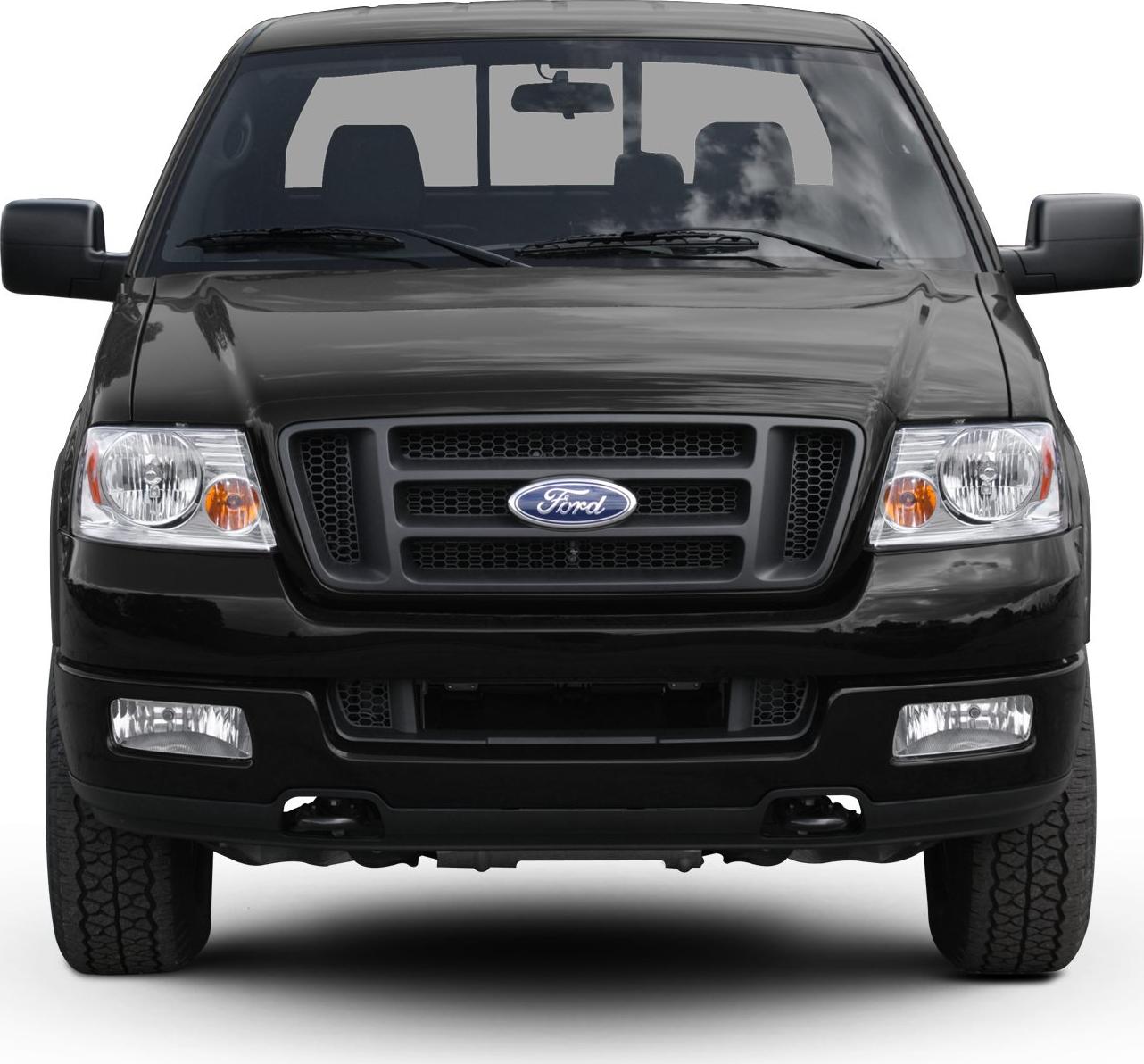 Front view of pickup with distinct grille and headlights