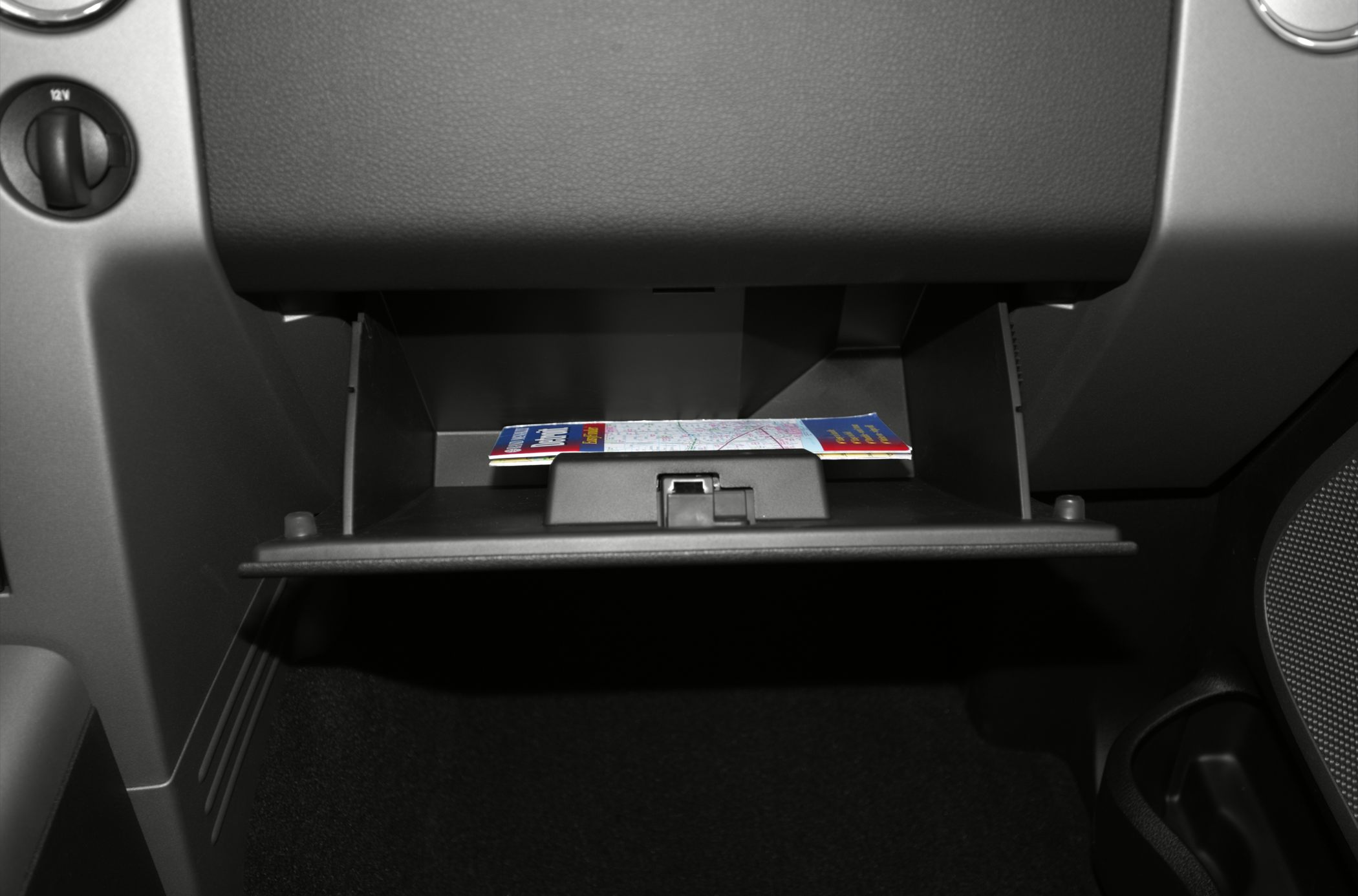 Glove compartment storage design with map inside