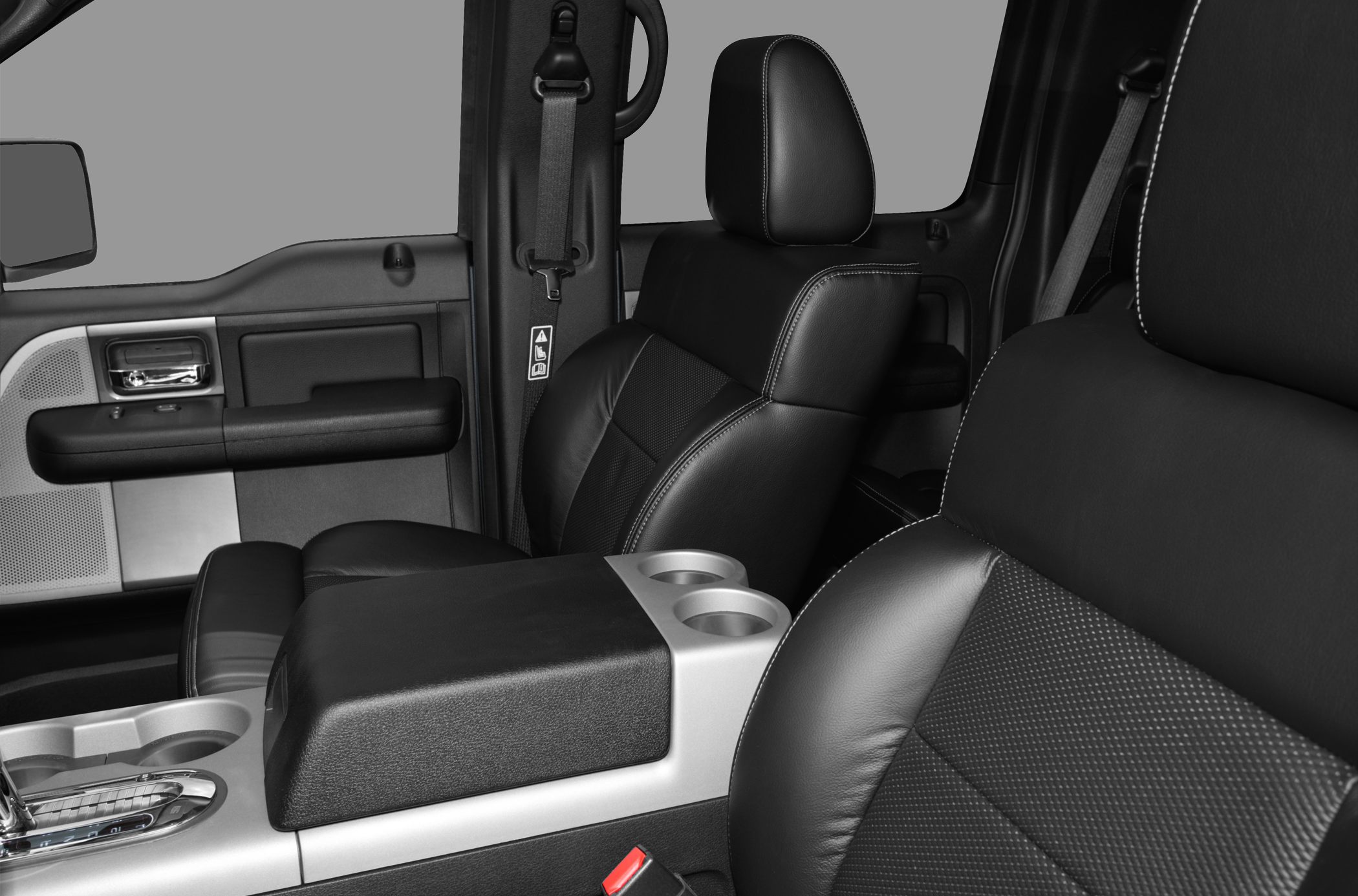 Black leather seats and center console with cup holders