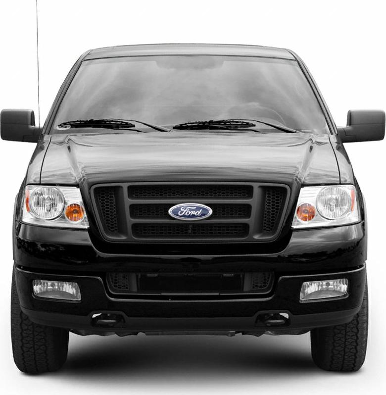 Front view showing black grille, dual headlights, and fog lamps