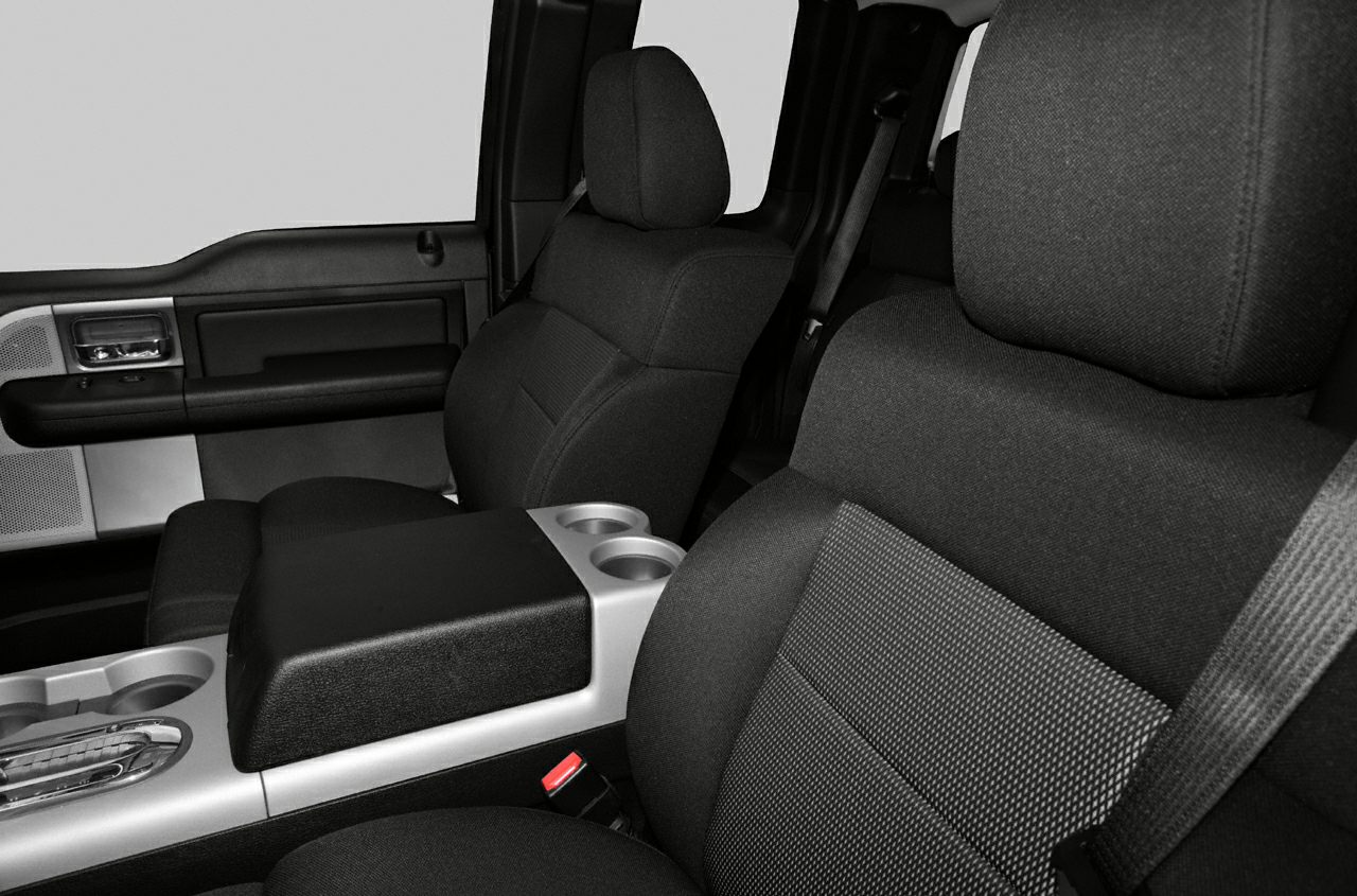 Fabric front seats with integrated headrests and center console with cup holders
