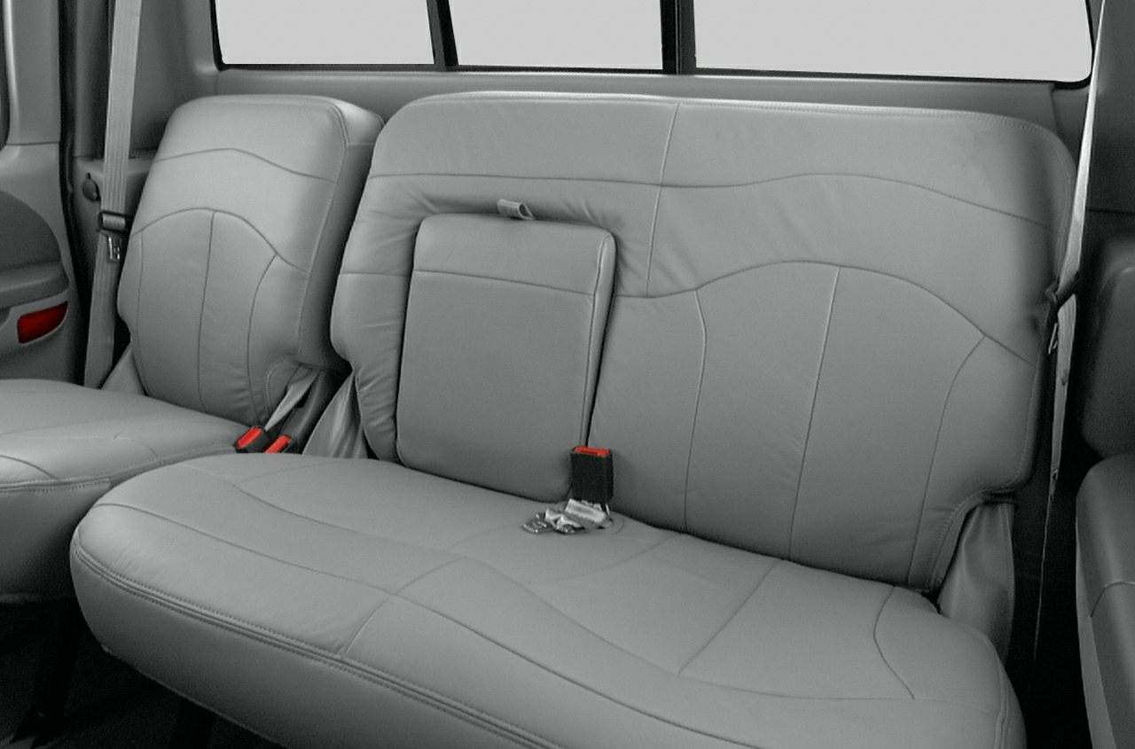 Gray leather rear bench seat with fold-down center armrest