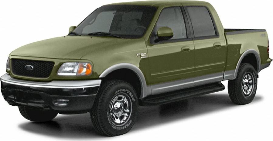 Front-side view of 1999 four-door pickup truck with robust body and rugged tires