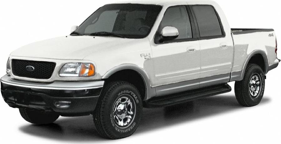 White extended cab pickup truck with chrome wheels and black accents