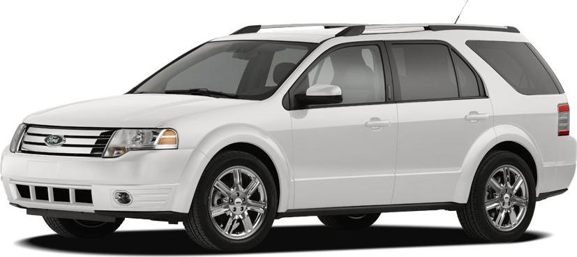 Front side view of white SUV with chrome wheels and roof rails