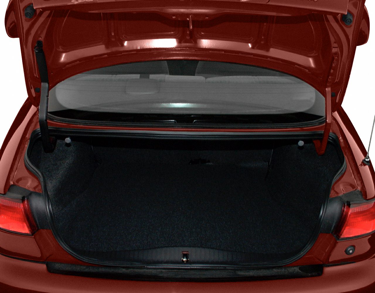 Open car trunk with spacious interior and rear lights.