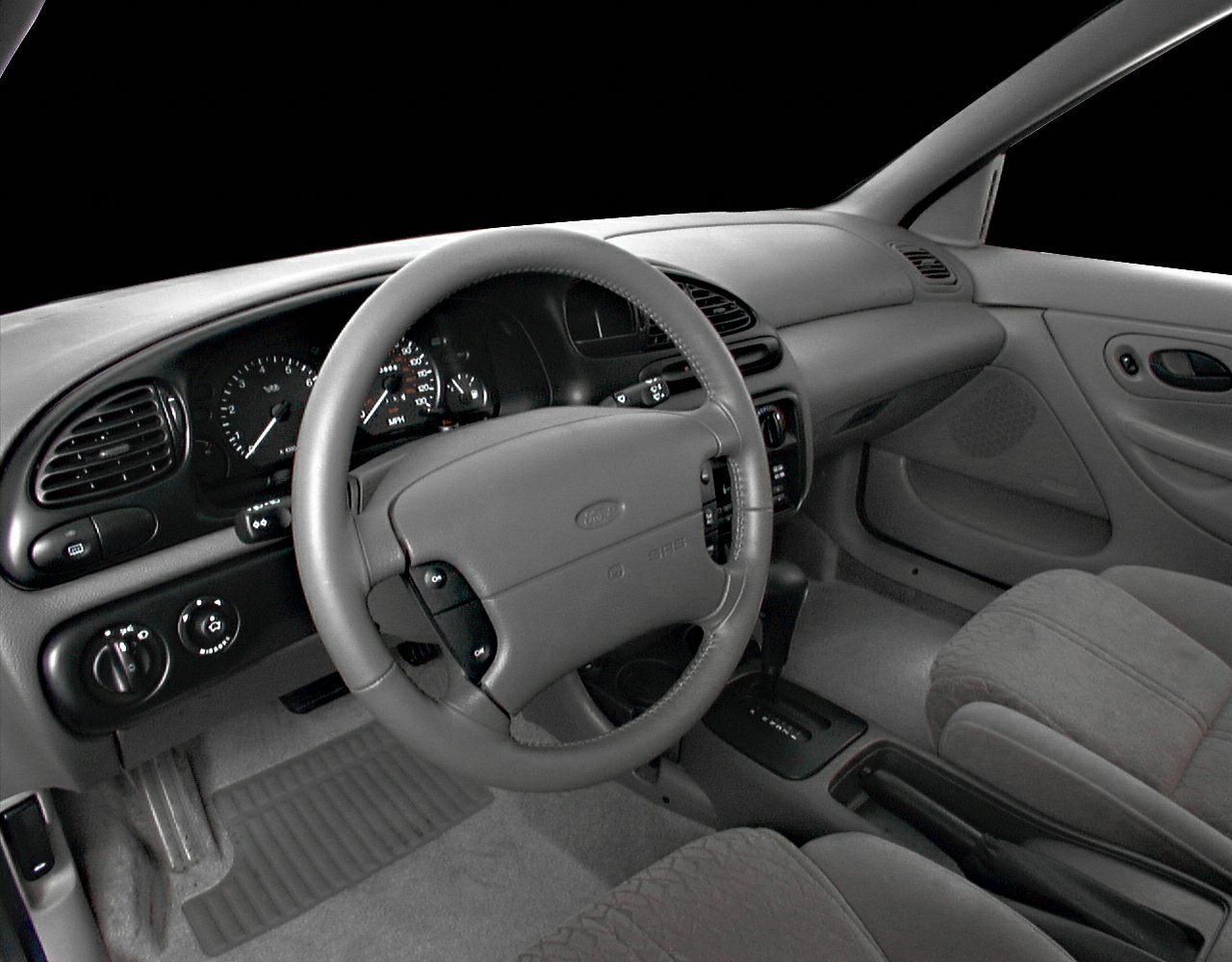 Interior dashboard and steering wheel with gear shift
