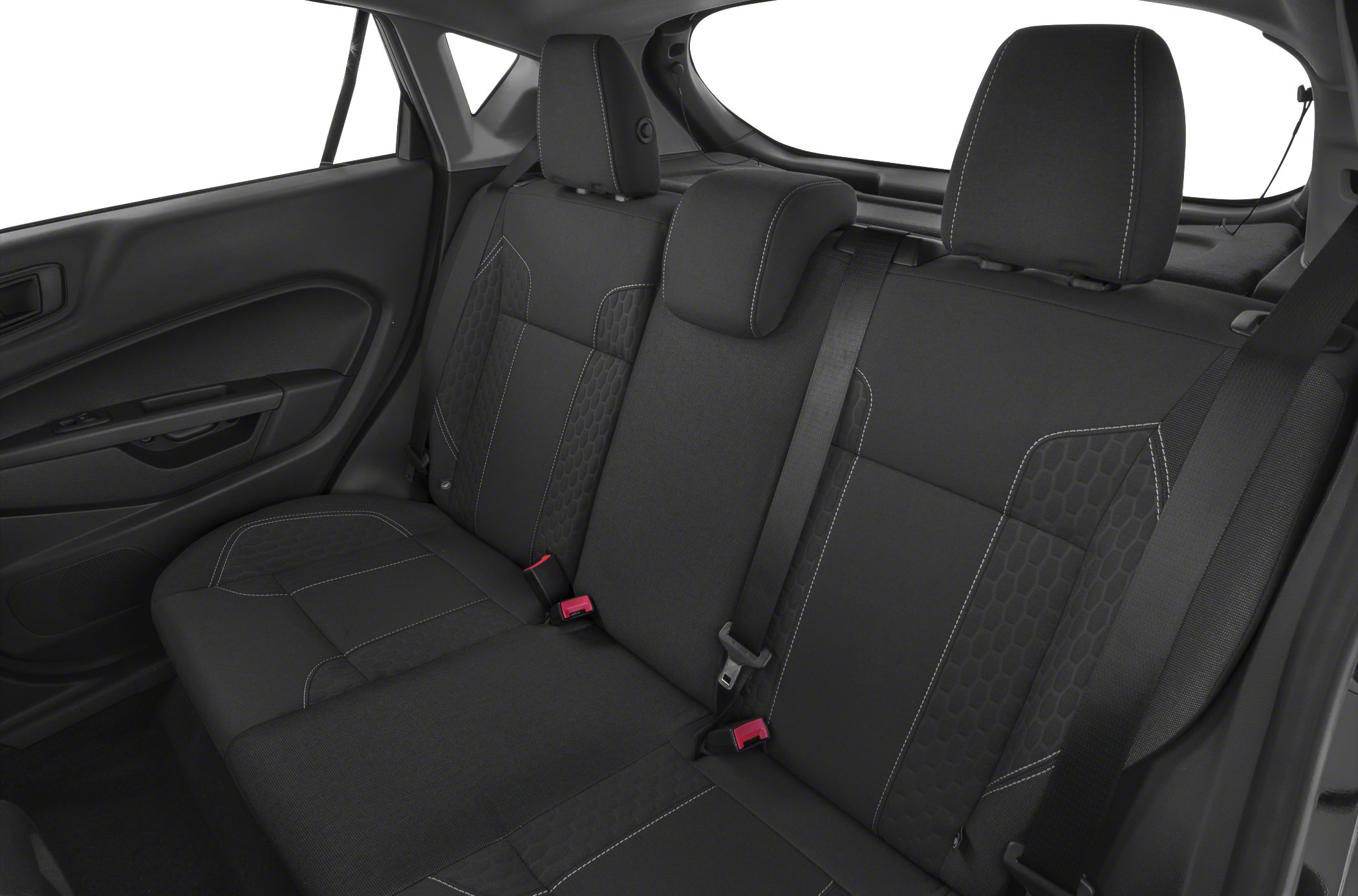 Black rear passenger seats with patterned upholstery and seatbelts