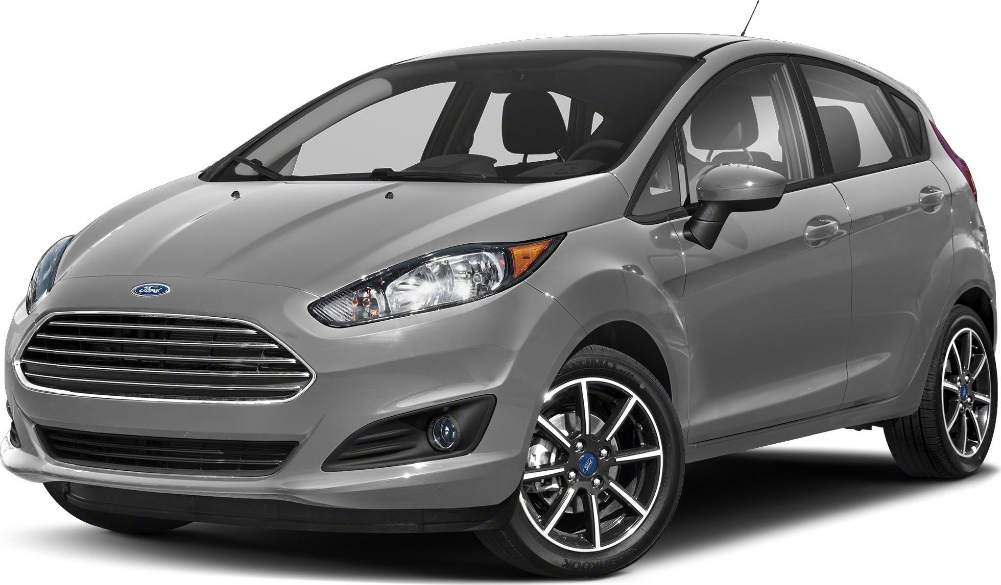 Front angle view with spotlight on alloy wheels and headlights