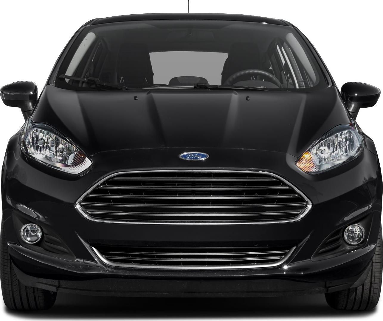Front view of compact hatchback showing grille and headlights