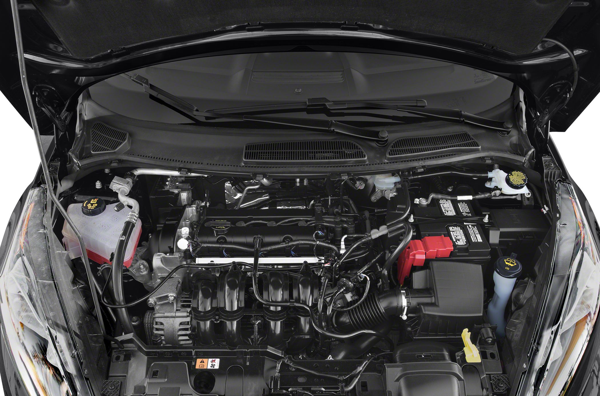 Compact engine bay with visible mechanical and fluid components