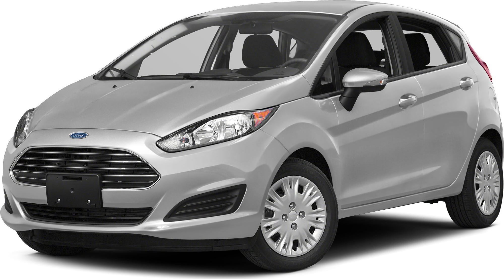 Silver small hatchback with aerodynamic headlights and horizontal slatted grille