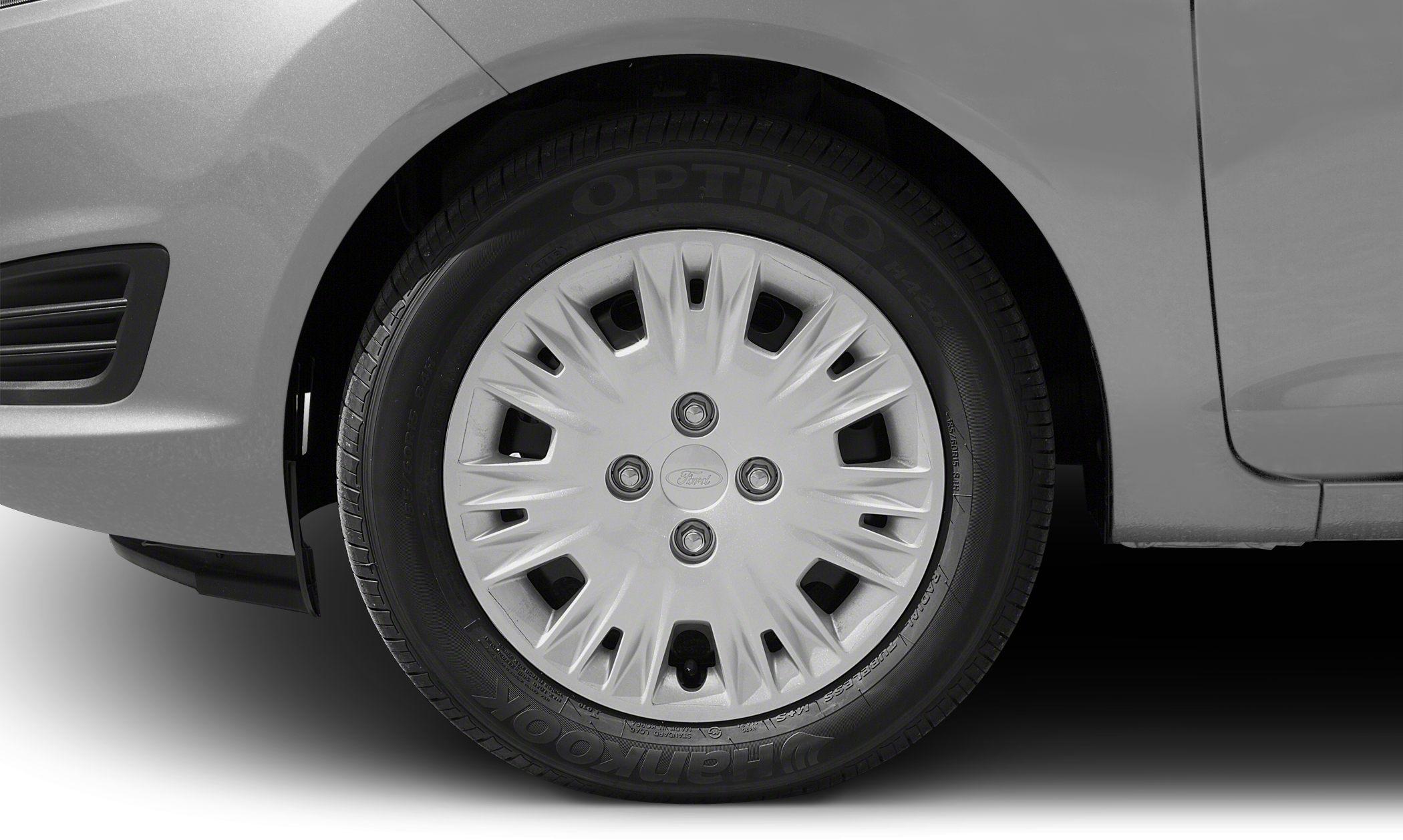 Closeup of a wheel with multi-spoke hubcap and Hankook tire