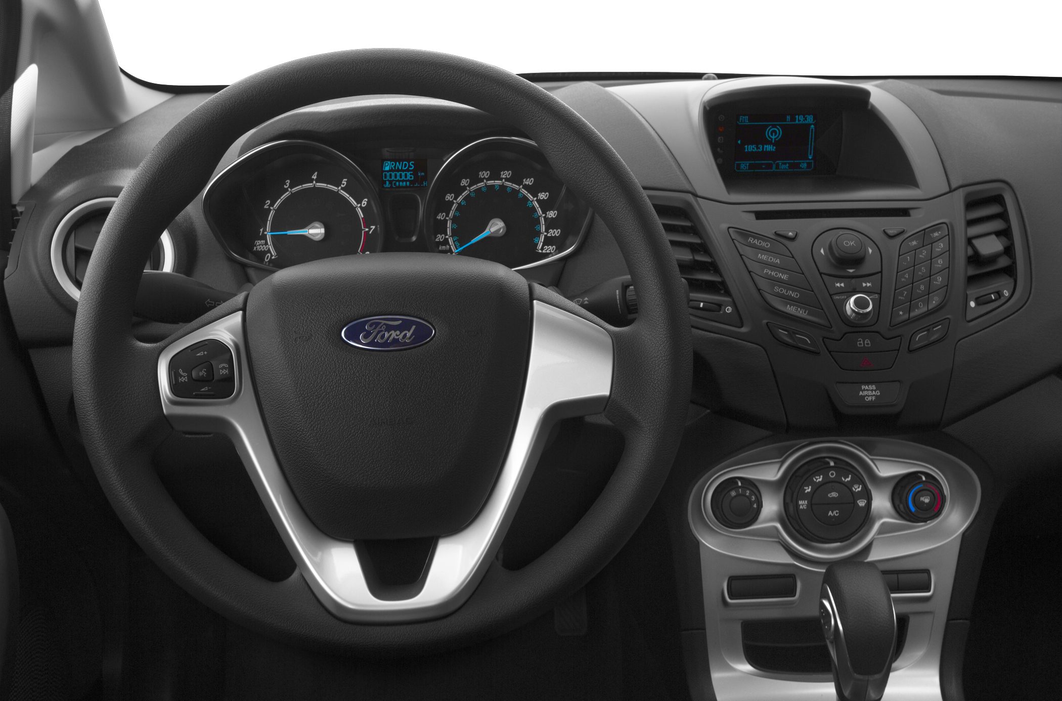 Steering wheel, instrument cluster, and center console with media and climate controls