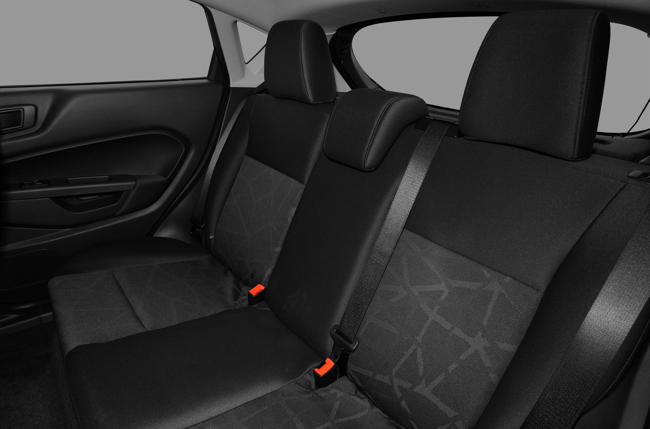 Rear seat interior with fabric upholstery and seatbelts